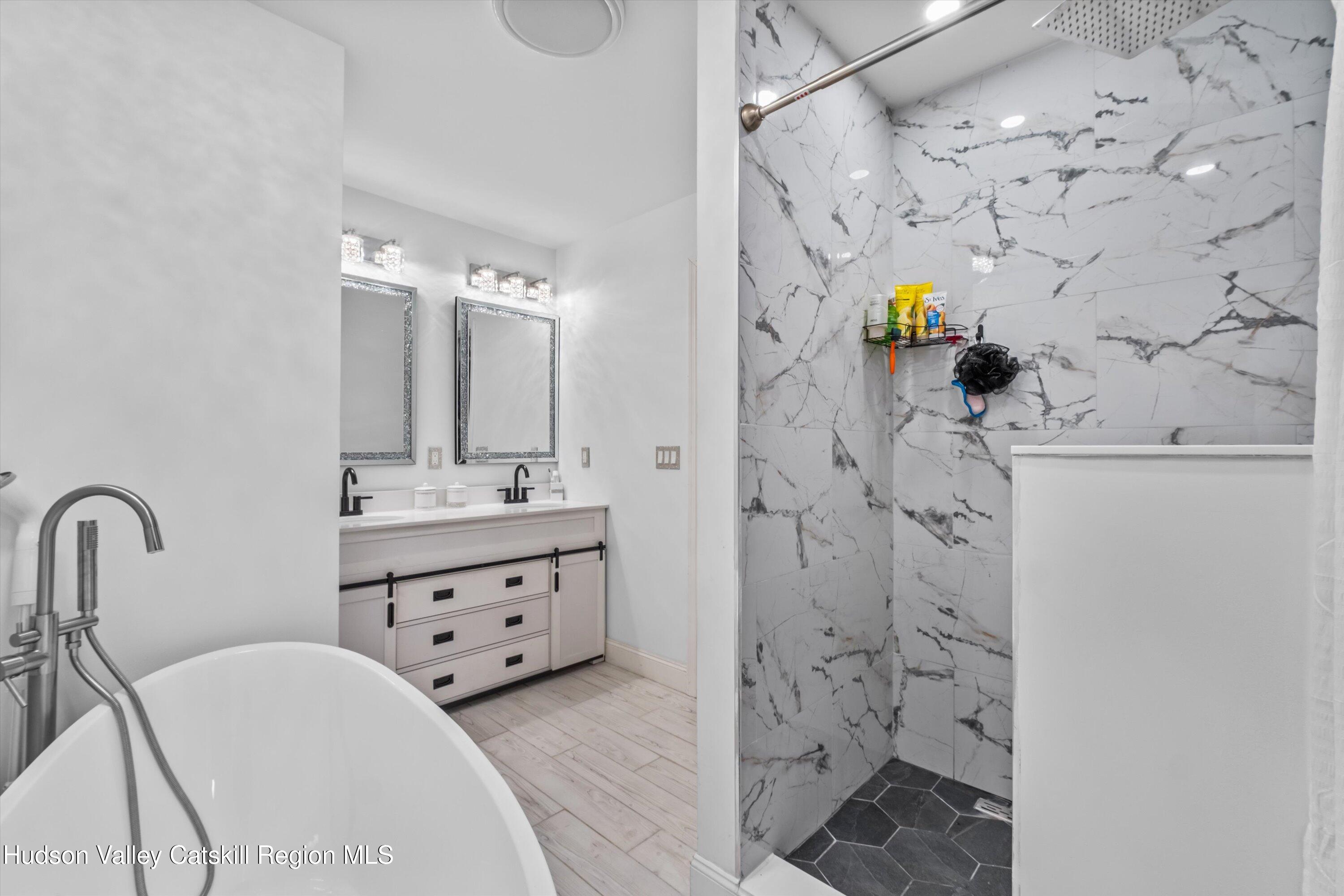 6 Smith Terrace Lloyd, NY 12528 - Photo 16 of 33 a bathroom with a sink a vanity and a mirror