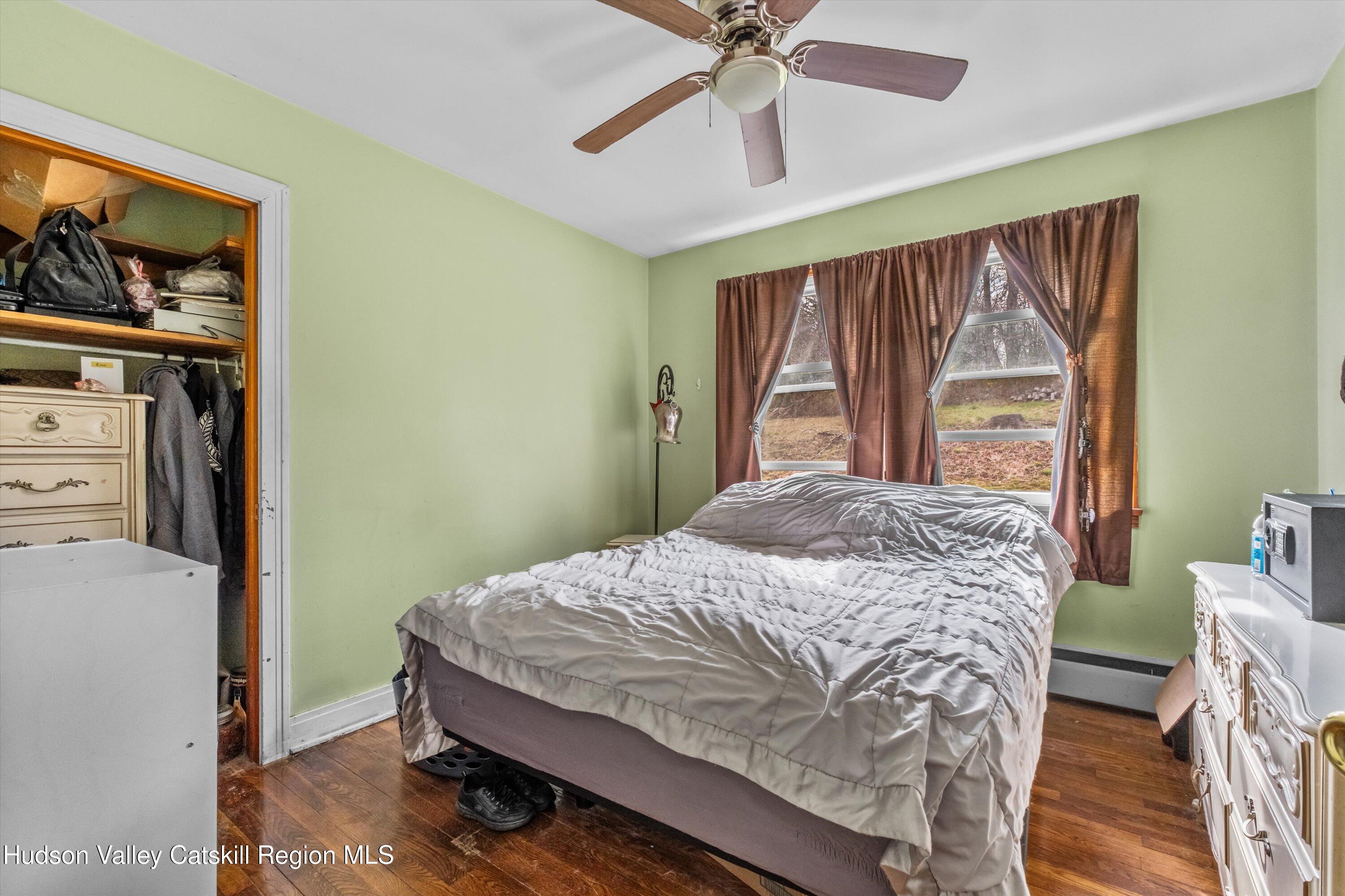 6 Smith Terrace Lloyd, NY 12528 - Photo 19 of 33 a bedroom with a bed and a window