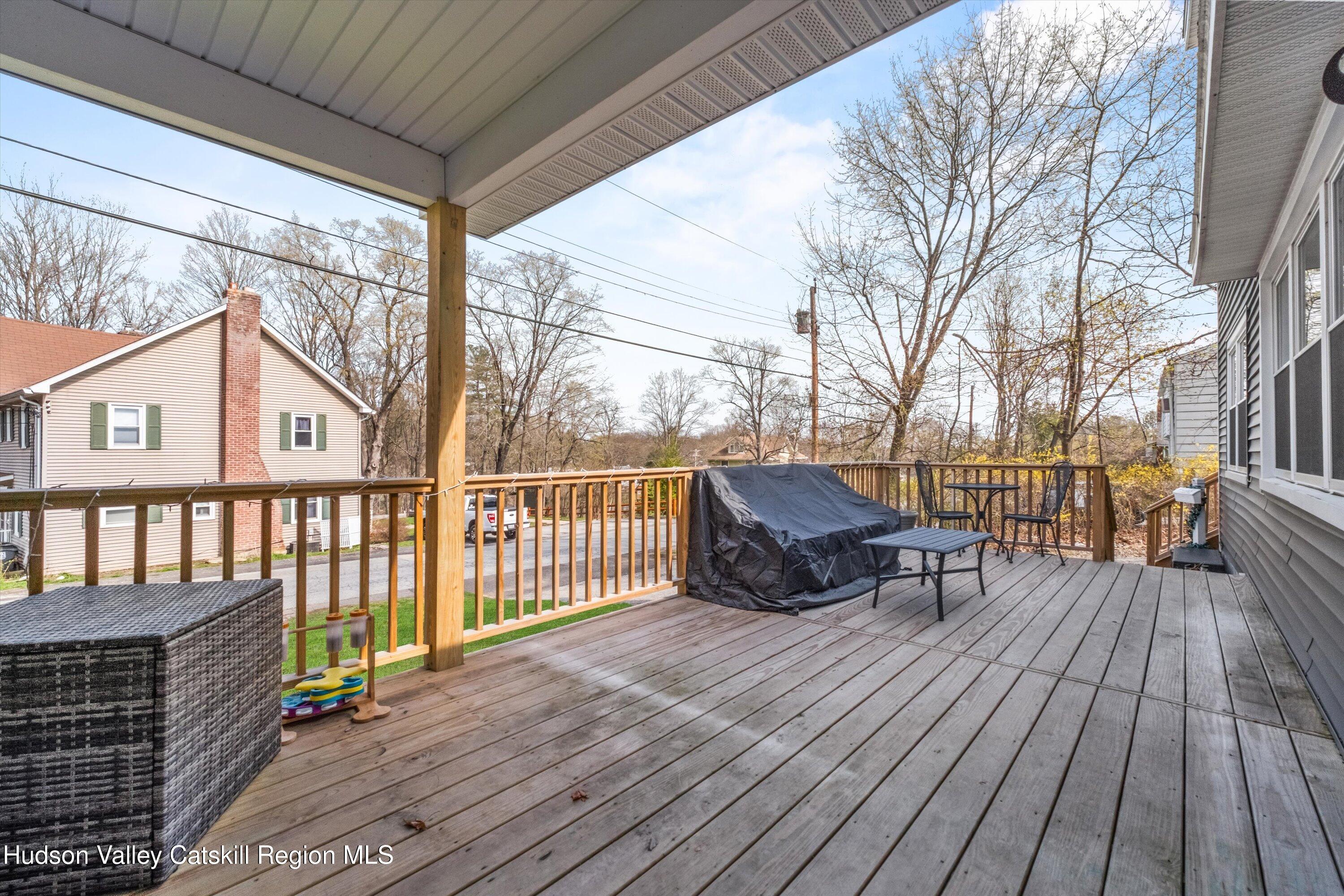 6 Smith Terrace Lloyd, NY 12528 - Photo 28 of 33 a view of roof deck with wooden floor and outdoor seating