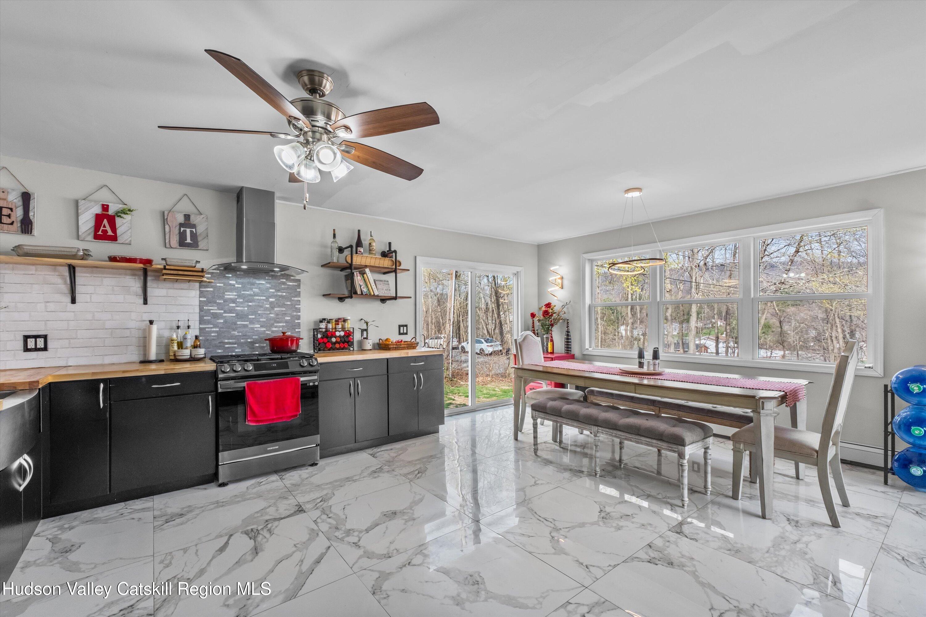 6 Smith Terrace Lloyd, NY 12528 - Photo 4 of 33 a living room with furniture and a large window