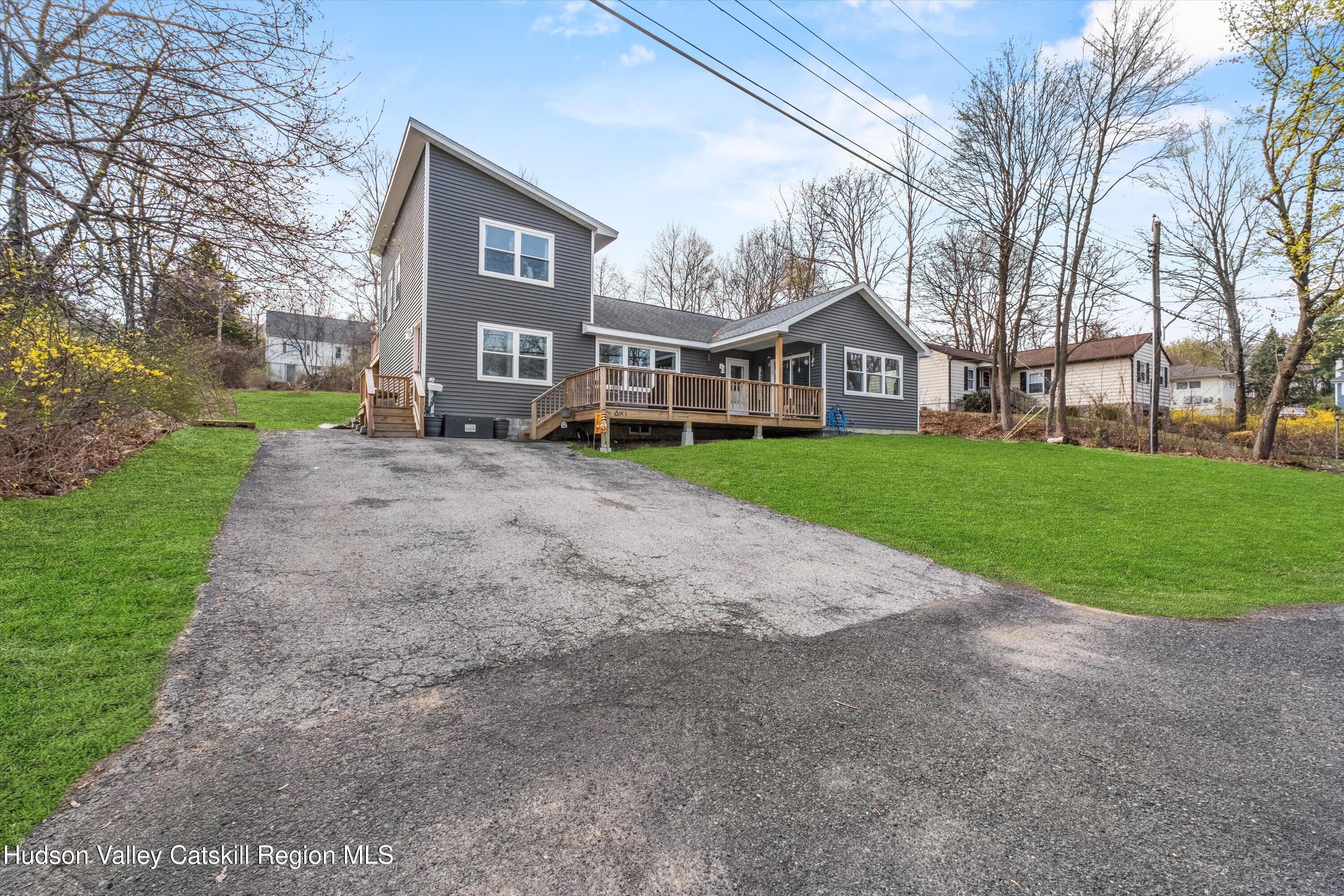 6 Smith Terrace Lloyd, NY 12528 - Photo 6 of 33 a view of a big house with a big yard and large trees