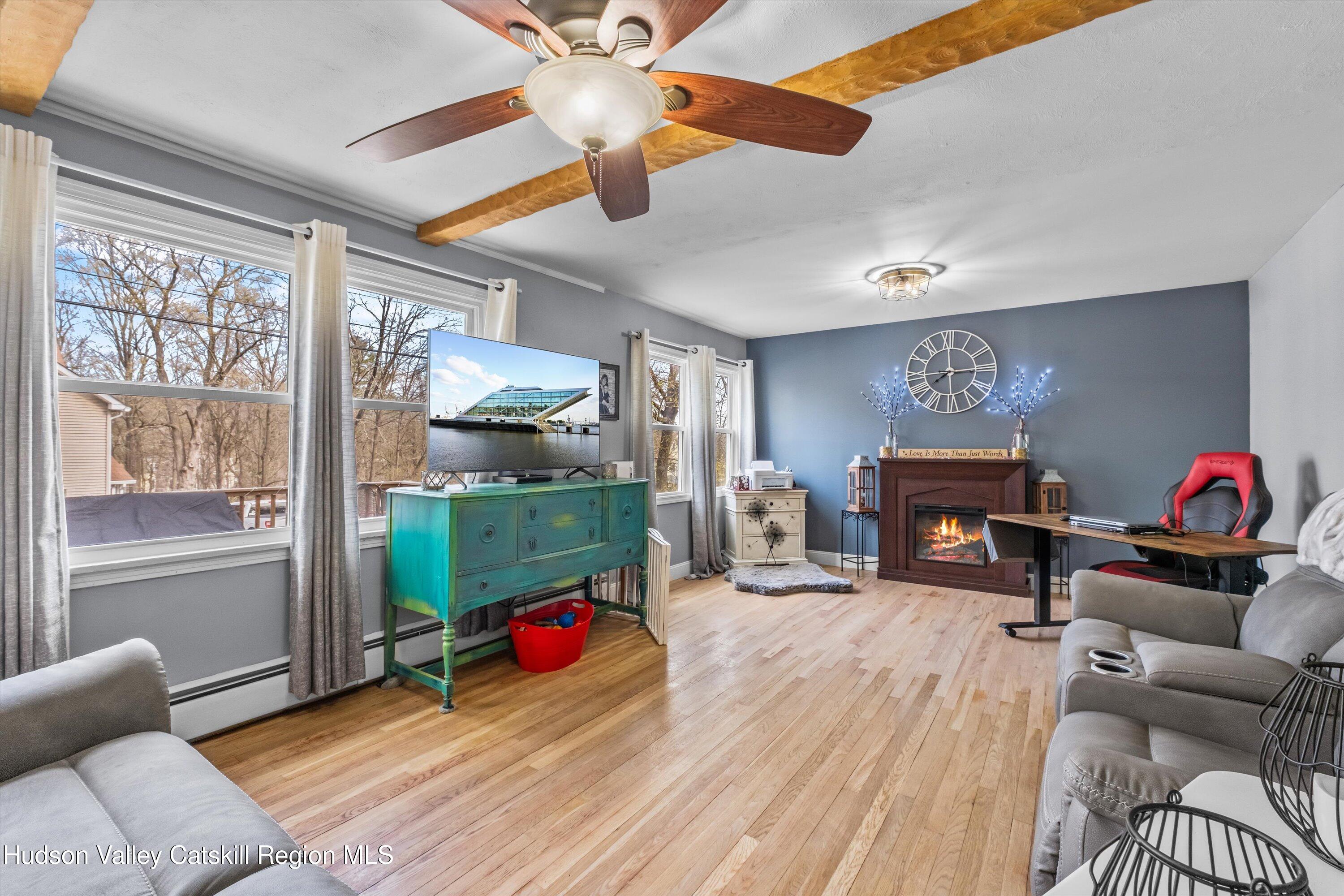 6 Smith Terrace Lloyd, NY 12528 - Photo 8 of 33 a children room with furniture and a fireplace