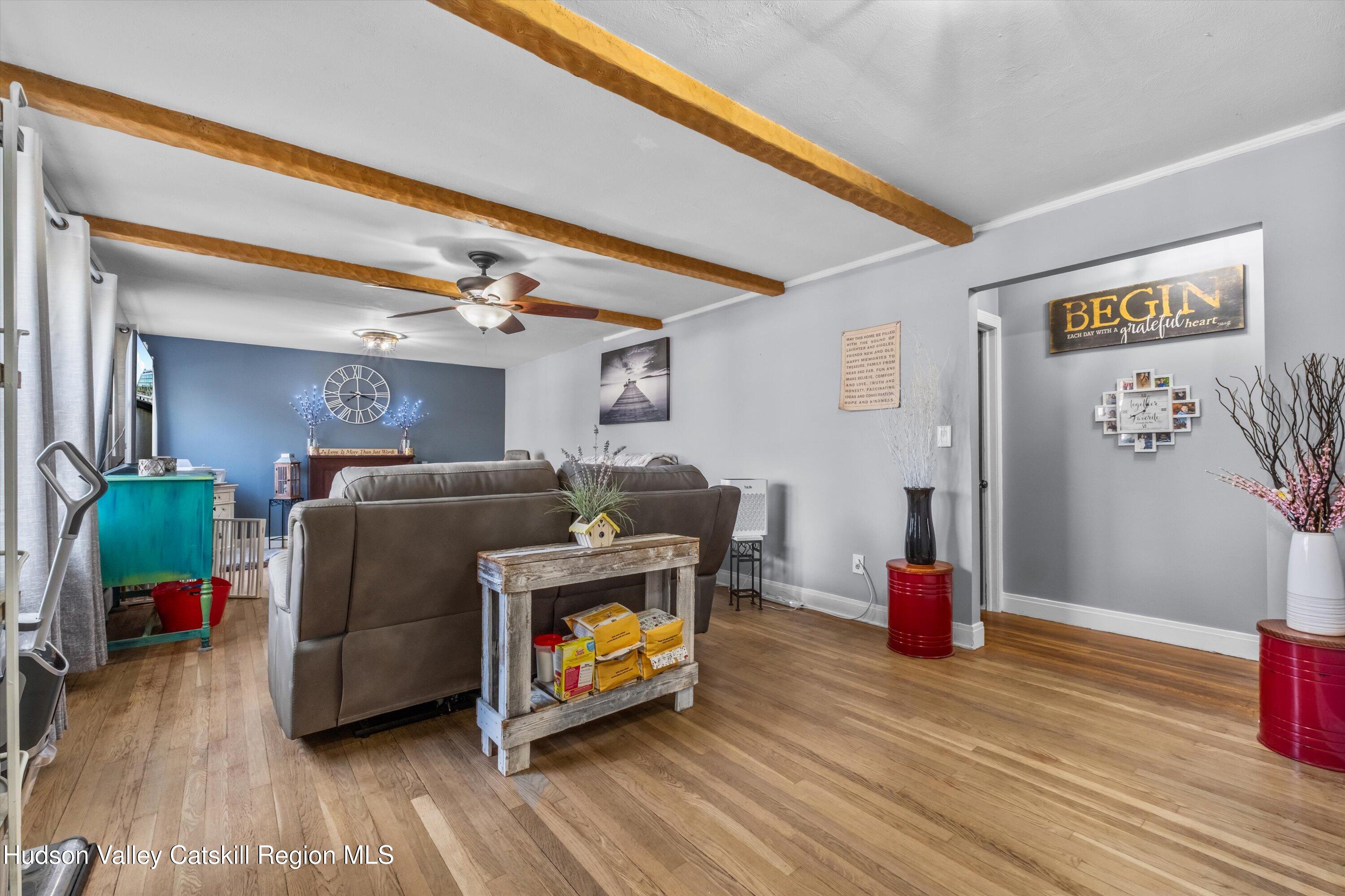 6 Smith Terrace Lloyd, NY 12528 - Photo 9 of 33 a living room with furniture and a wooden floor