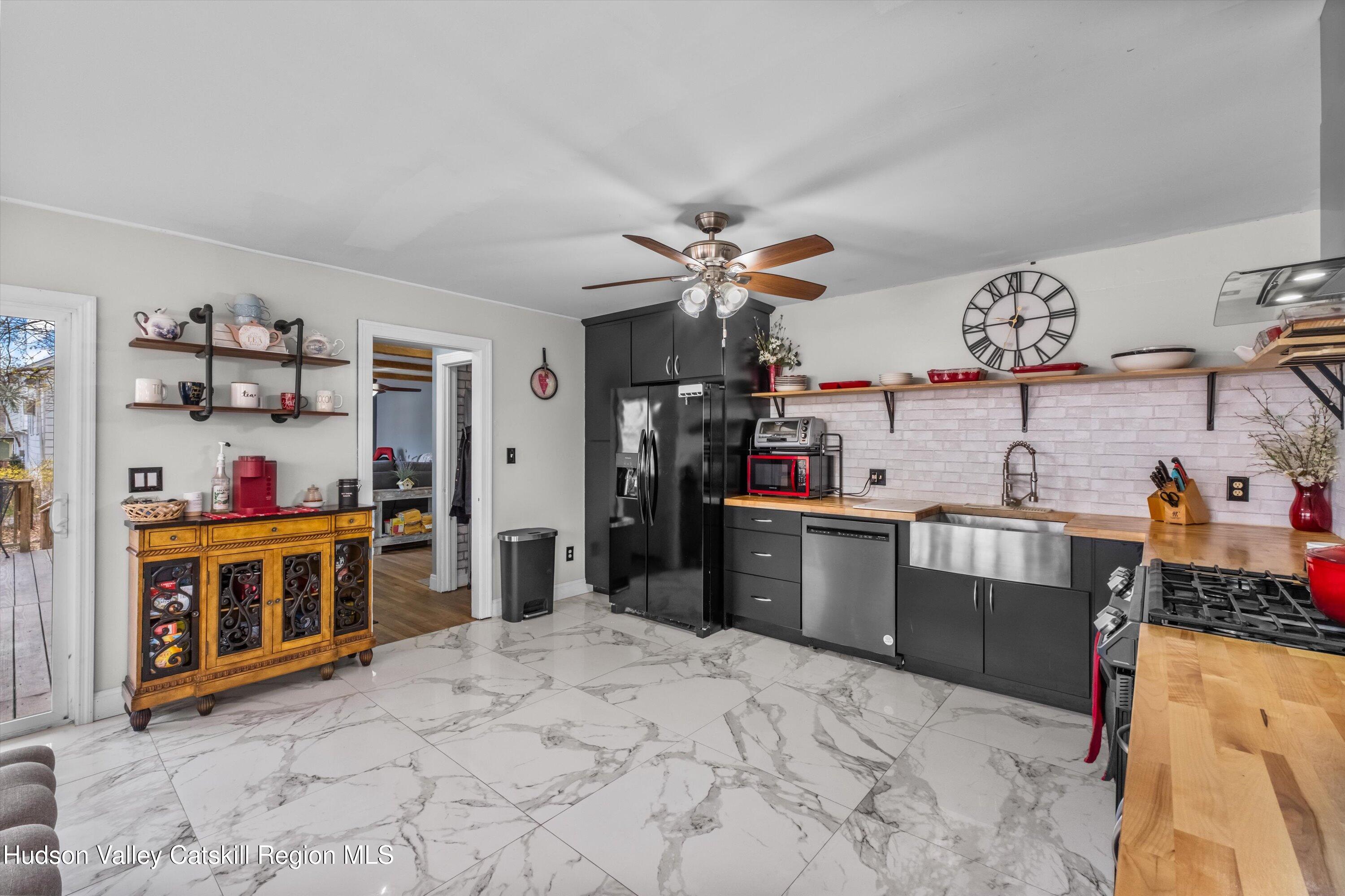6 Smith Terrace Lloyd, NY 12528 - Photo 10 of 33 a kitchen with stainless steel appliances kitchen island a stove and a sink