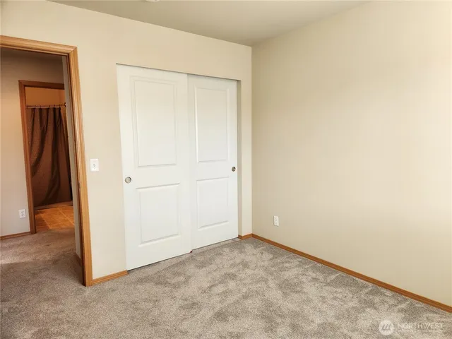 an empty room with closet