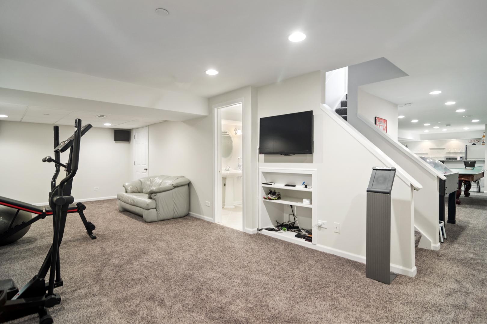 6238 Pine Tree Drive Long Grove, IL 60047 - Photo 22 of 28 a living room with furniture and a flat screen tv