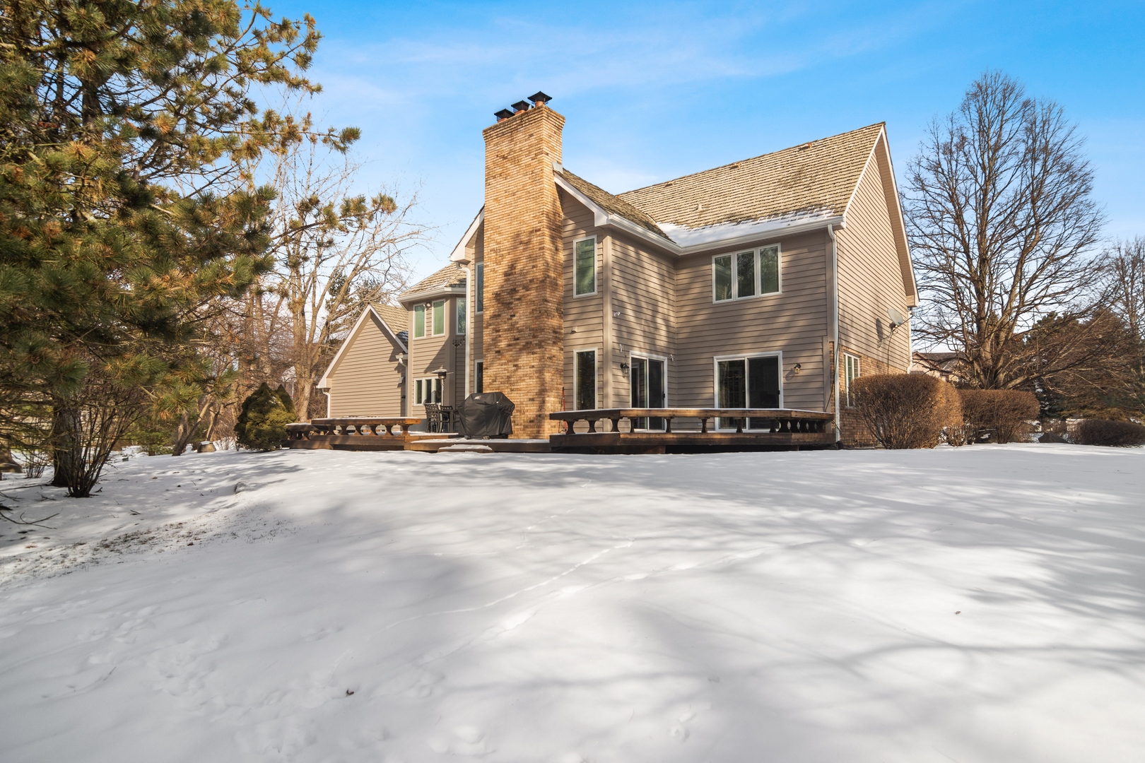 6238 Pine Tree Drive Long Grove, IL 60047 - Photo 28 of 28 a view of a building with snow on the road