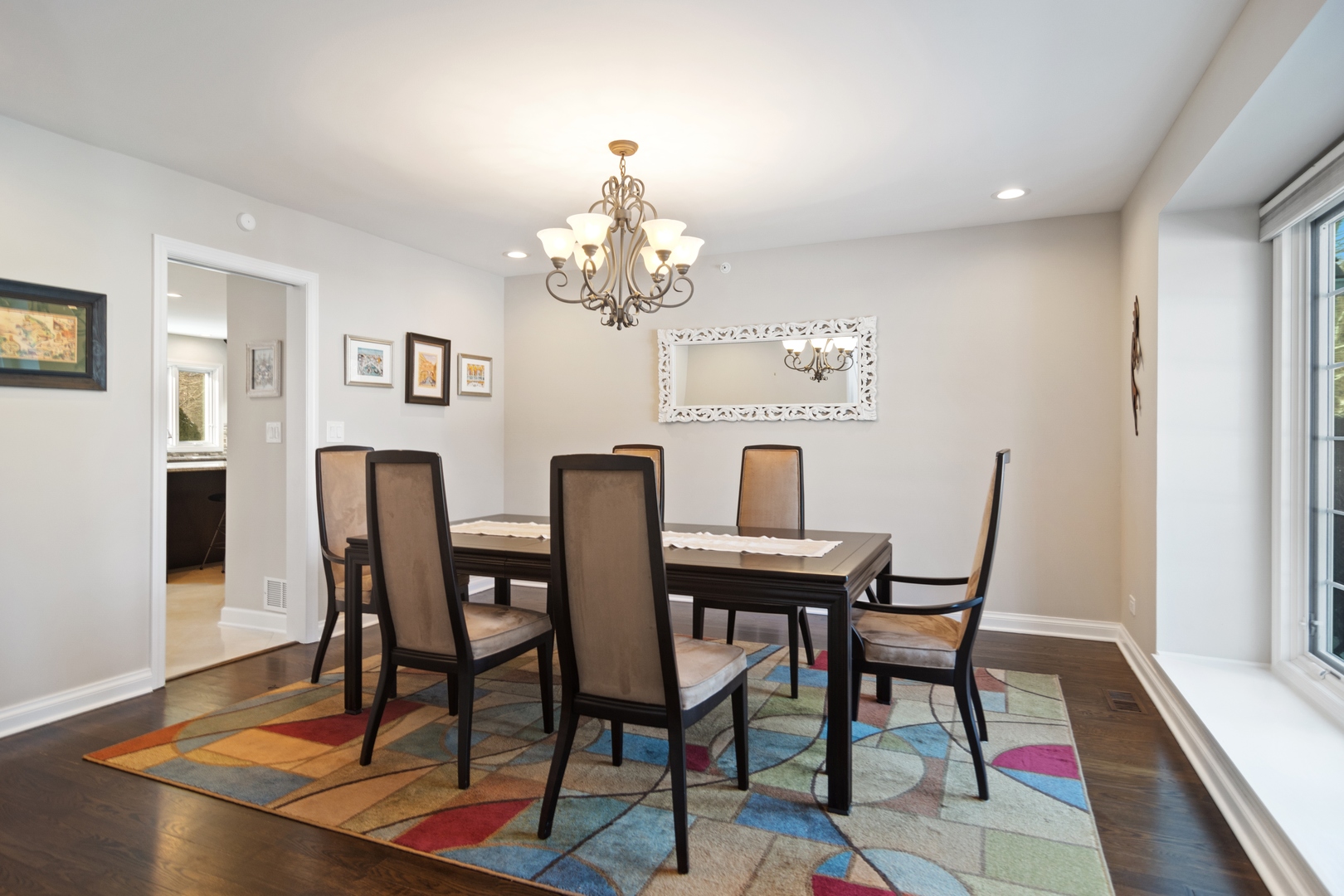 6238 Pine Tree Drive Long Grove, IL 60047 - Photo 9 of 28 a view of a dining room with furniture and wooden floor