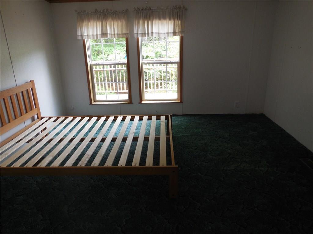 211 Brett Hill Road South Paris, ME 04281 - Photo 11 of 35 Master Bedroom has nice large windows.