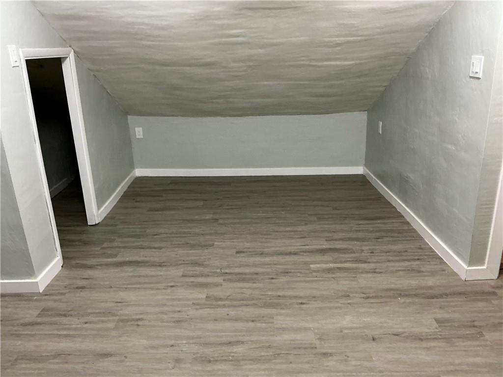 3326 Spring Garden Road Pittsburgh, PA 15212 - Photo 14 of 21 a view of wooden floor with staircase