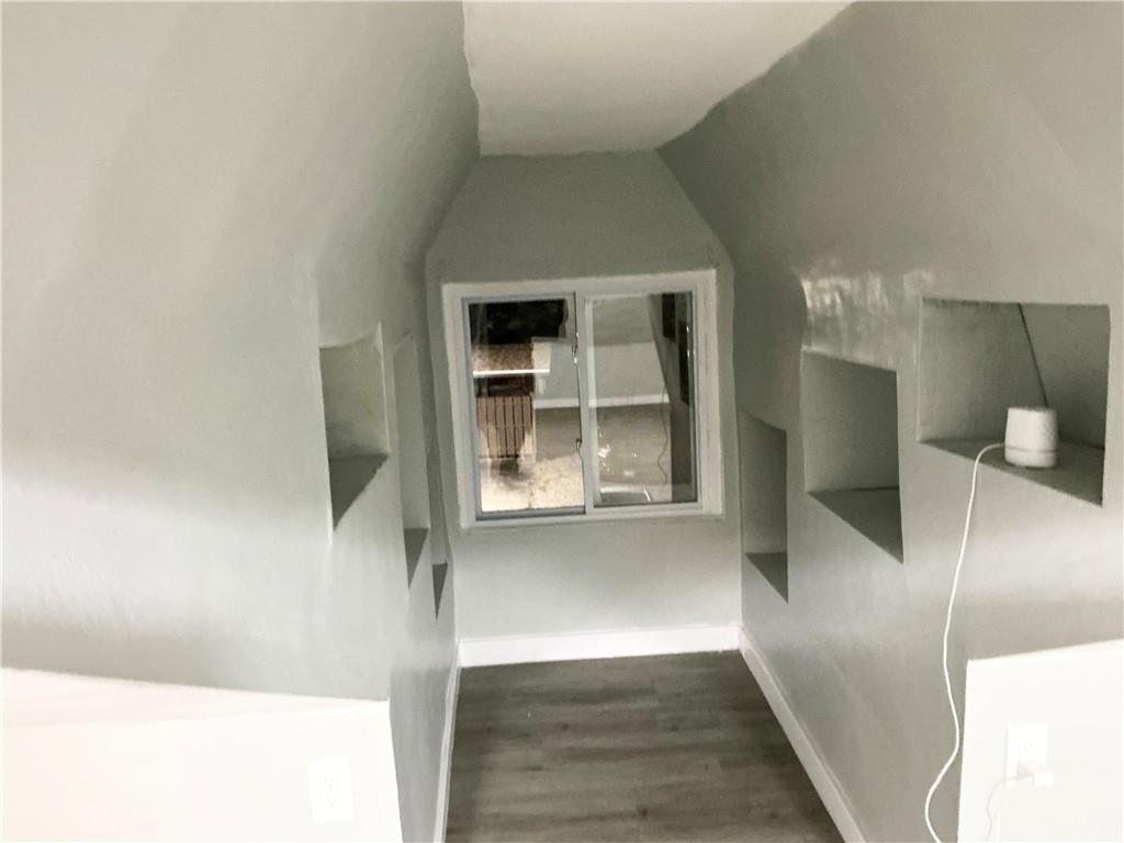 3326 Spring Garden Road Pittsburgh, PA 15212 - Photo 3 of 21 a view of a living room with a wooden floor