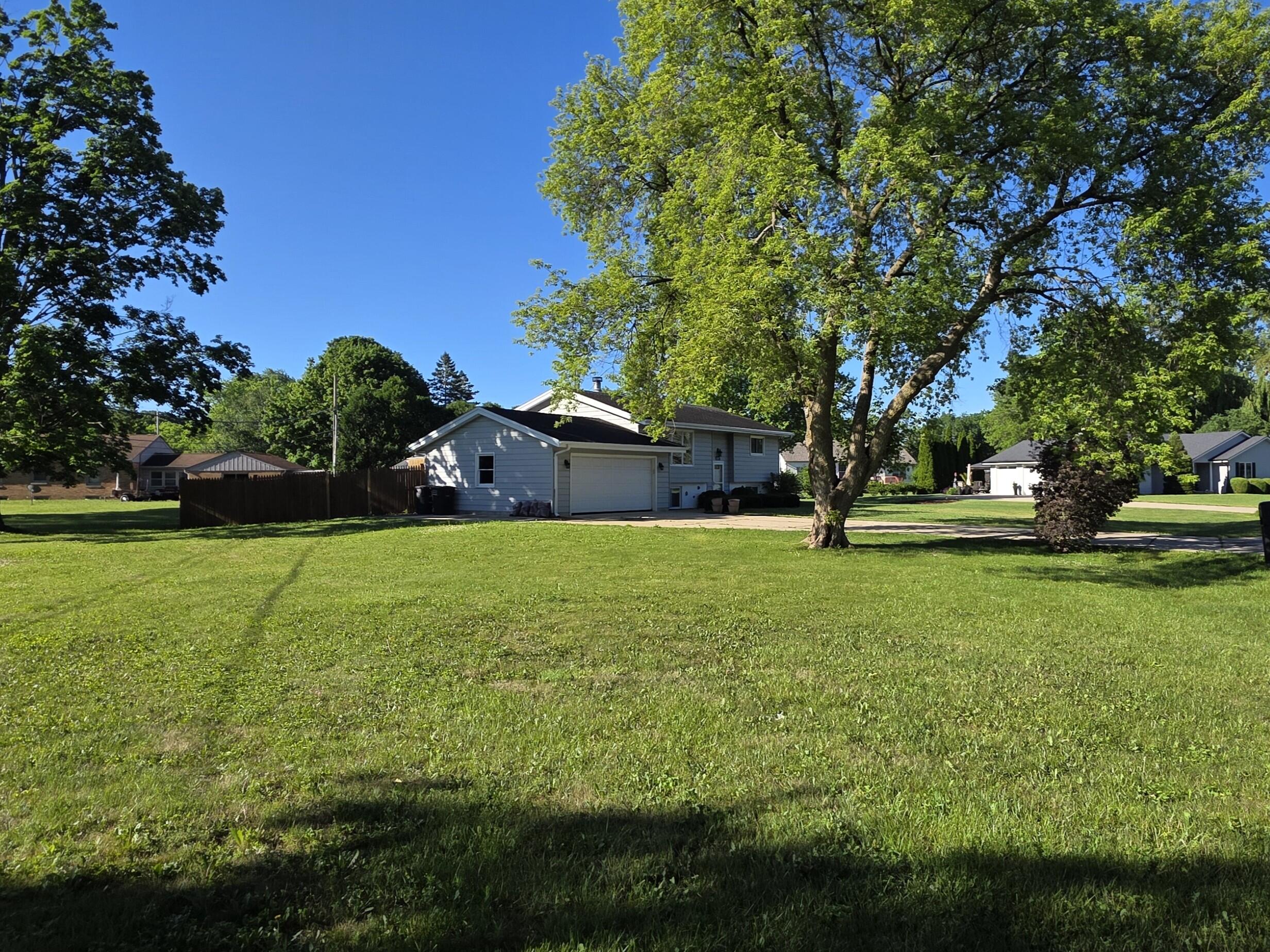 12237 West Larkspur Road Franklin, WI 53132 - Photo 2 of 42 Side Yard