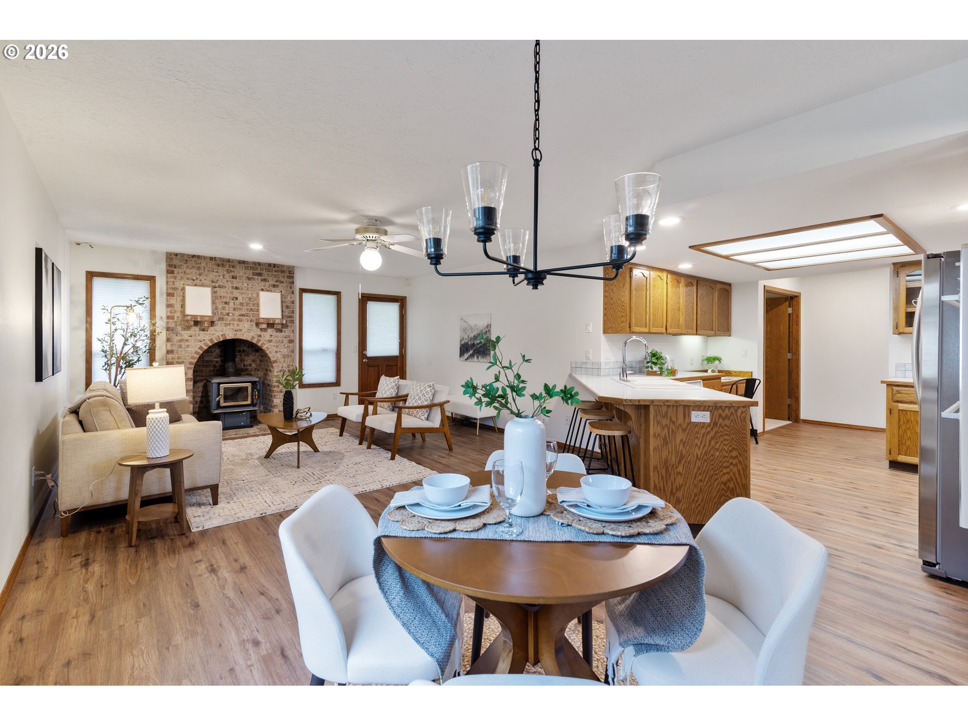 2730 Northeast Roberts Avenue Gresham, OR 97030 - Photo 20 of 43 a view of a dining room with furniture and wooden floor