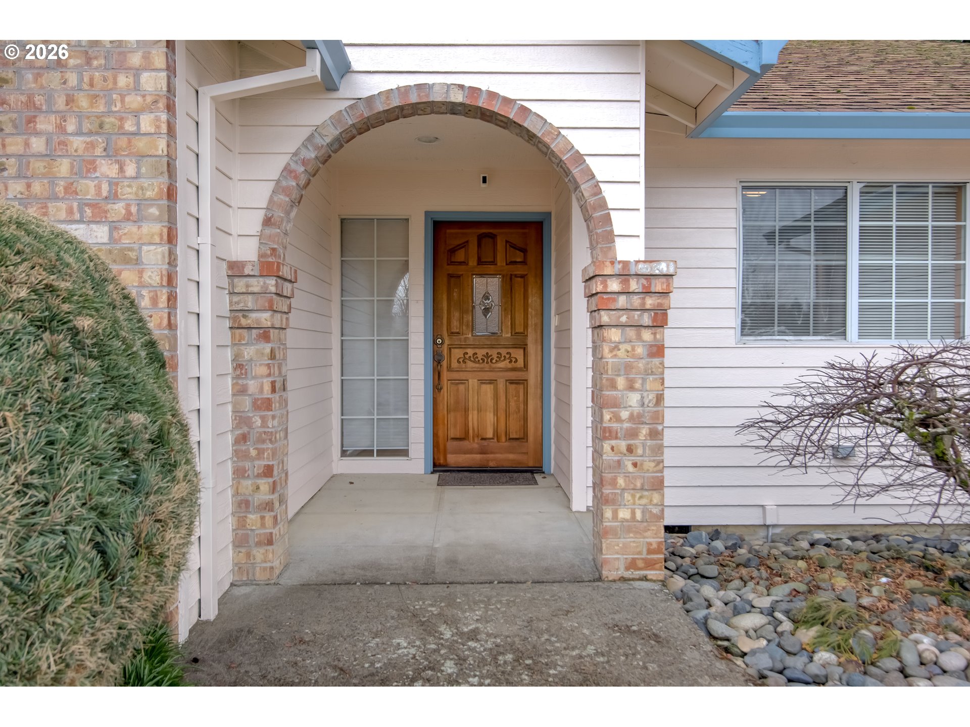 2730 Northeast Roberts Avenue Gresham, OR 97030 - Photo 2 of 43 a view of a wooden door of the house