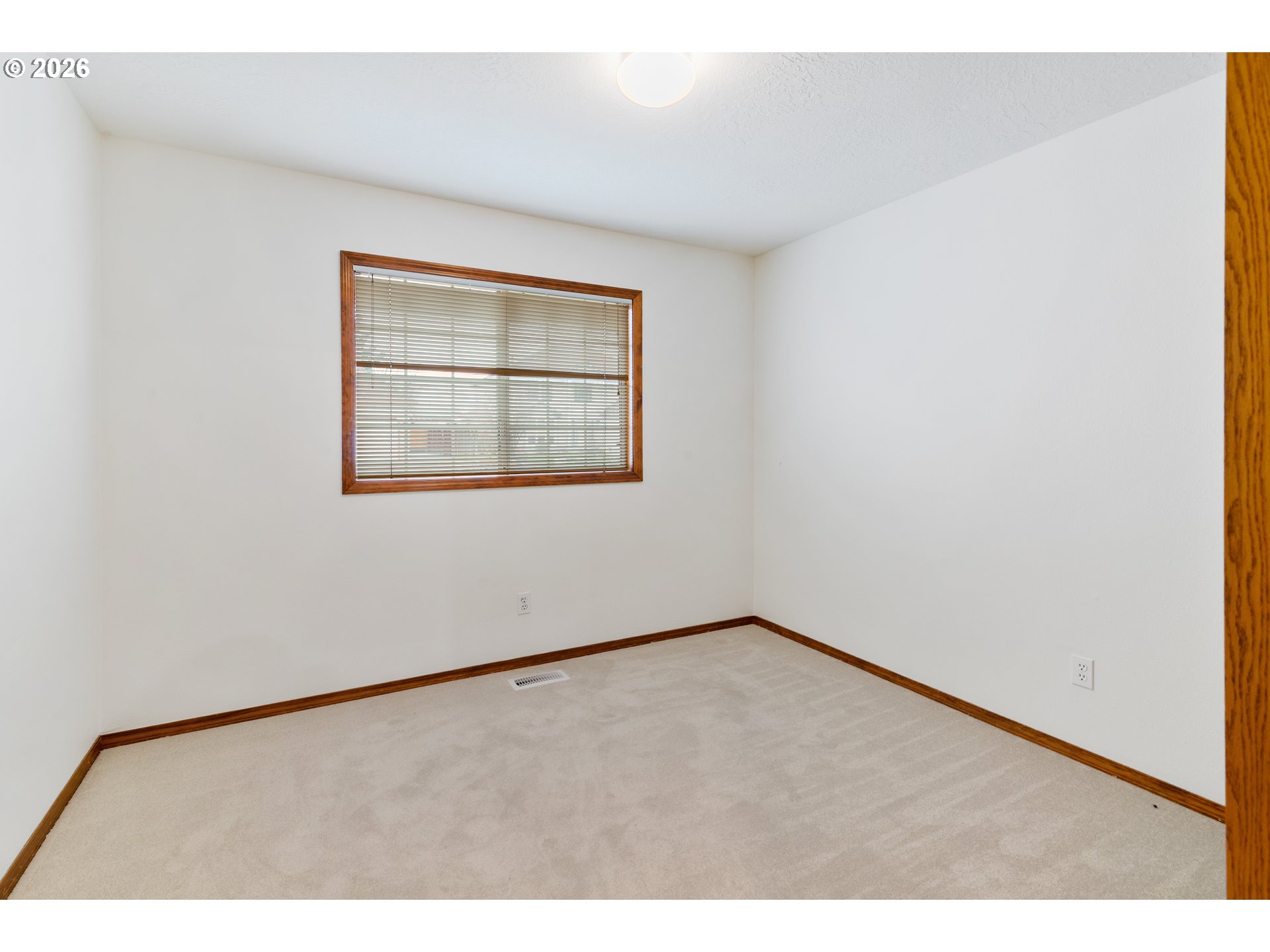2730 Northeast Roberts Avenue Gresham, OR 97030 - Photo 27 of 43 a view of an empty room with a window