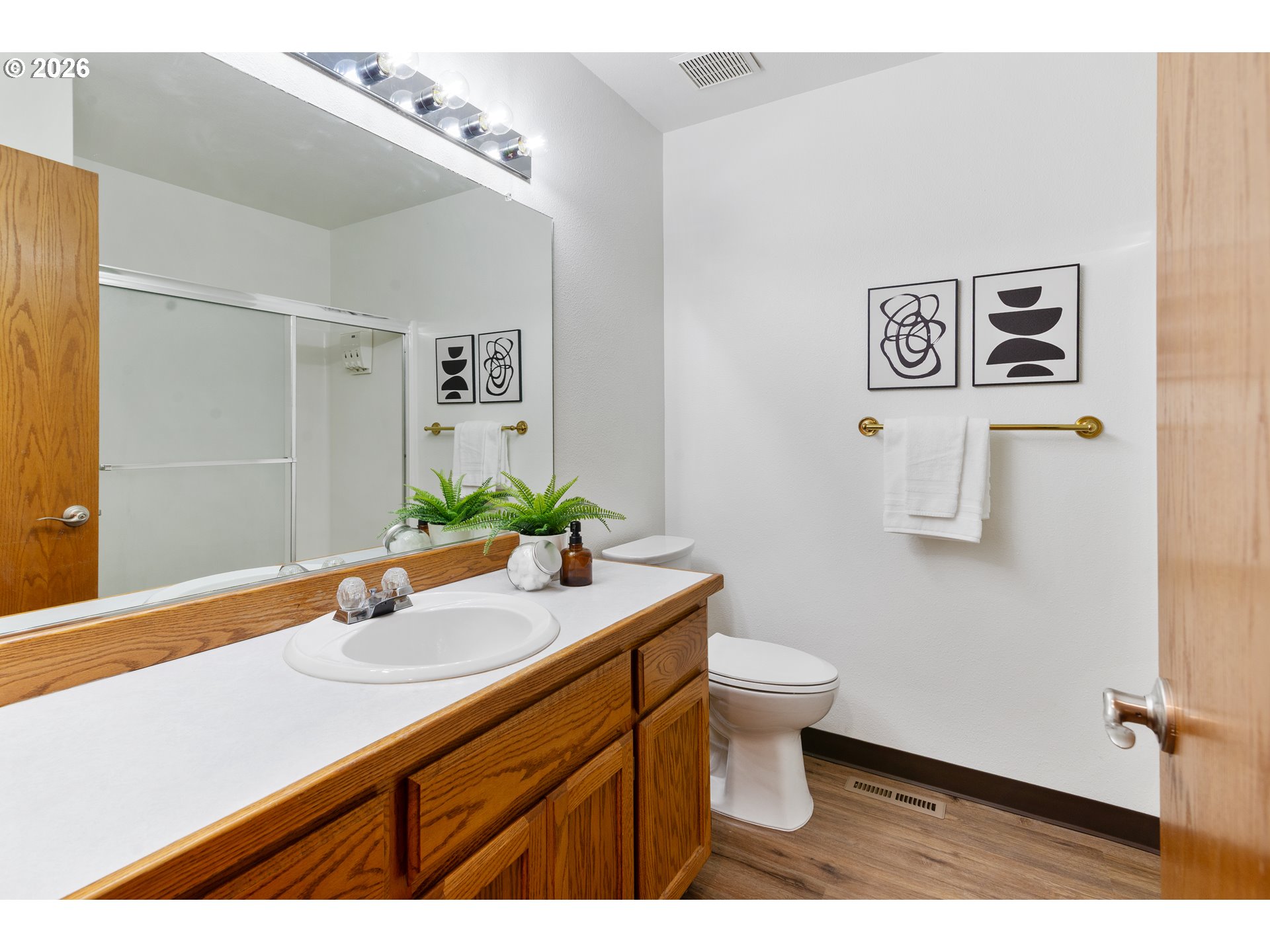 2730 Northeast Roberts Avenue Gresham, OR 97030 - Photo 29 of 43 a bathroom with a sink and a mirror