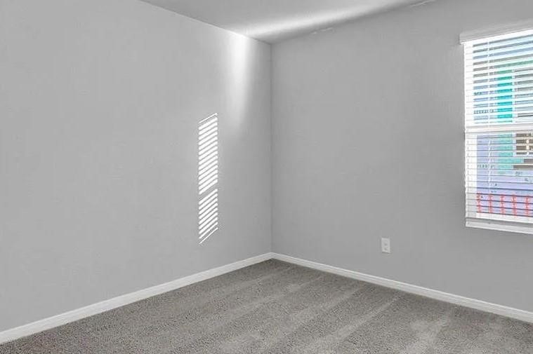211 Hamilton Pool Lane Bastrop, TX 78602 - Photo 4 of 11 an empty room with windows