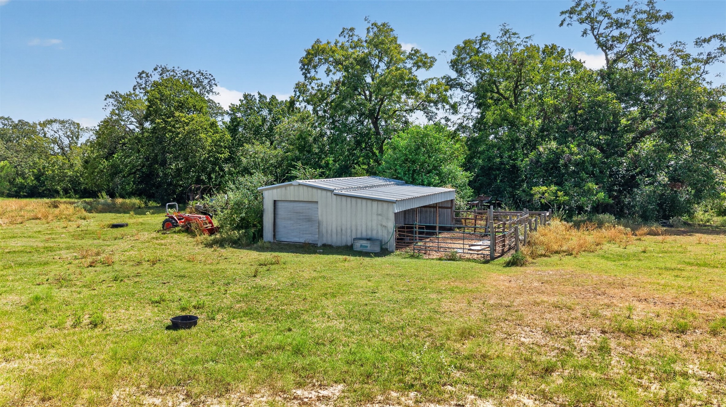 3085 Shupak Road Bellville, TX 77418 - Photo 10 of 42 The second outbuilding on the property at the back of the pasture.