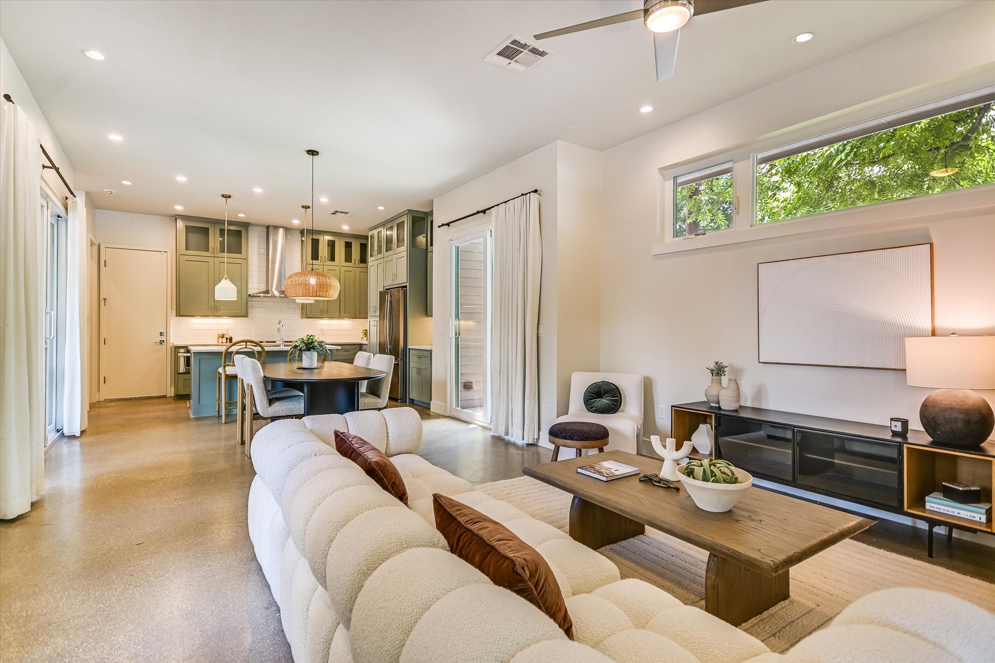 1605 Hether Street Austin, TX 78704 - Photo 8 of 26 Open-concept living area with polished concrete flooring, recessed lighting, and a ceiling fan