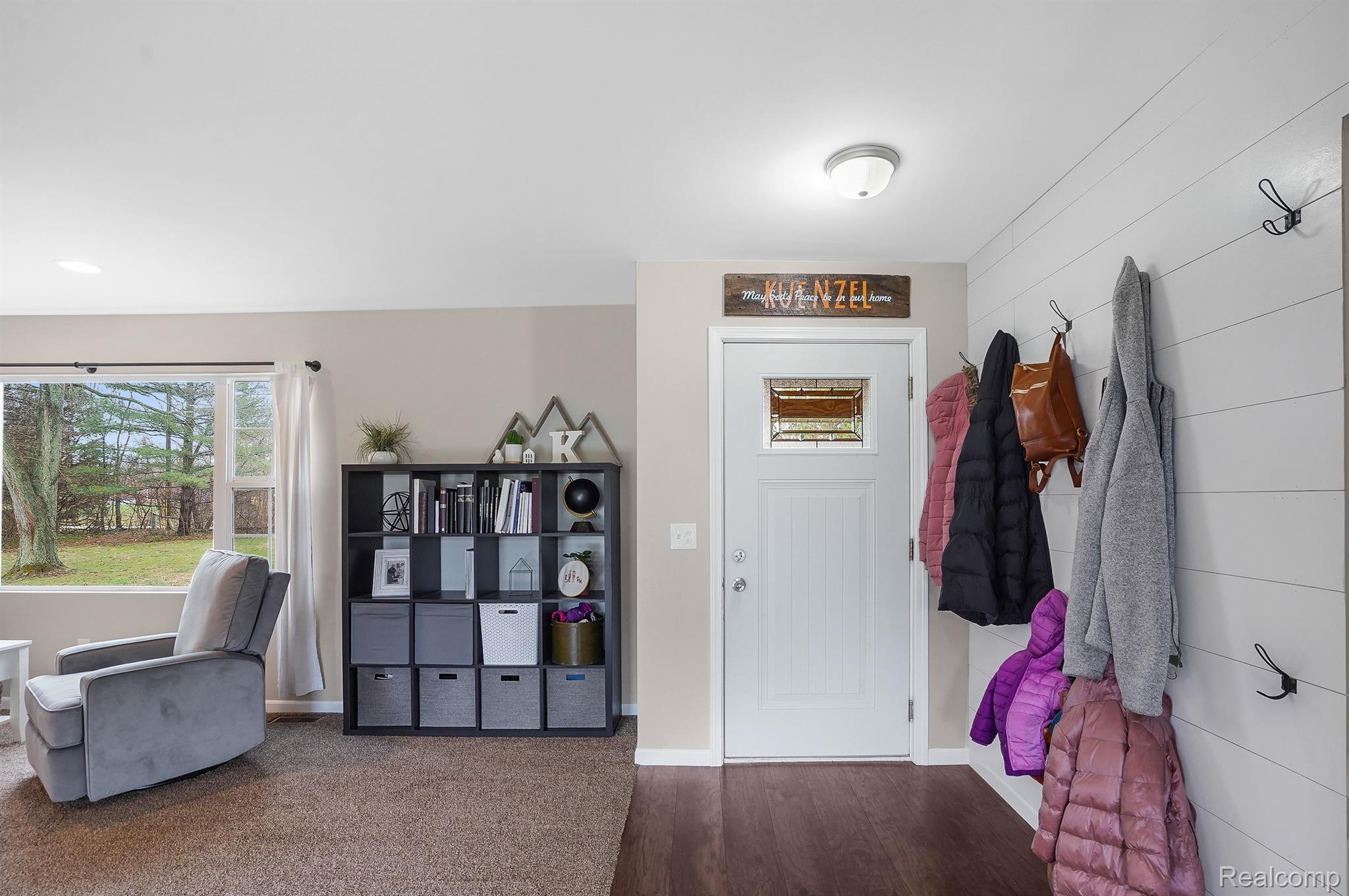 7269 Brophy Road Howell, MI 48855 - Photo 3 of 23 Front Entrance with shiplap wall