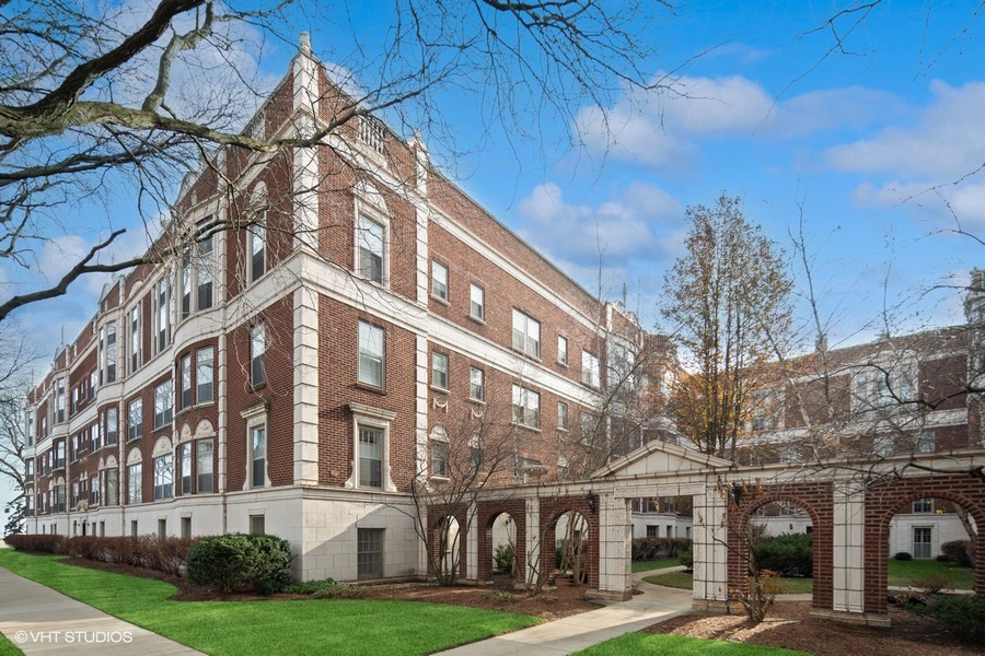 478 Sheridan Road, Unit 2 Evanston, IL 60202 - Photo 2 of 16 a view of a building with a yard
