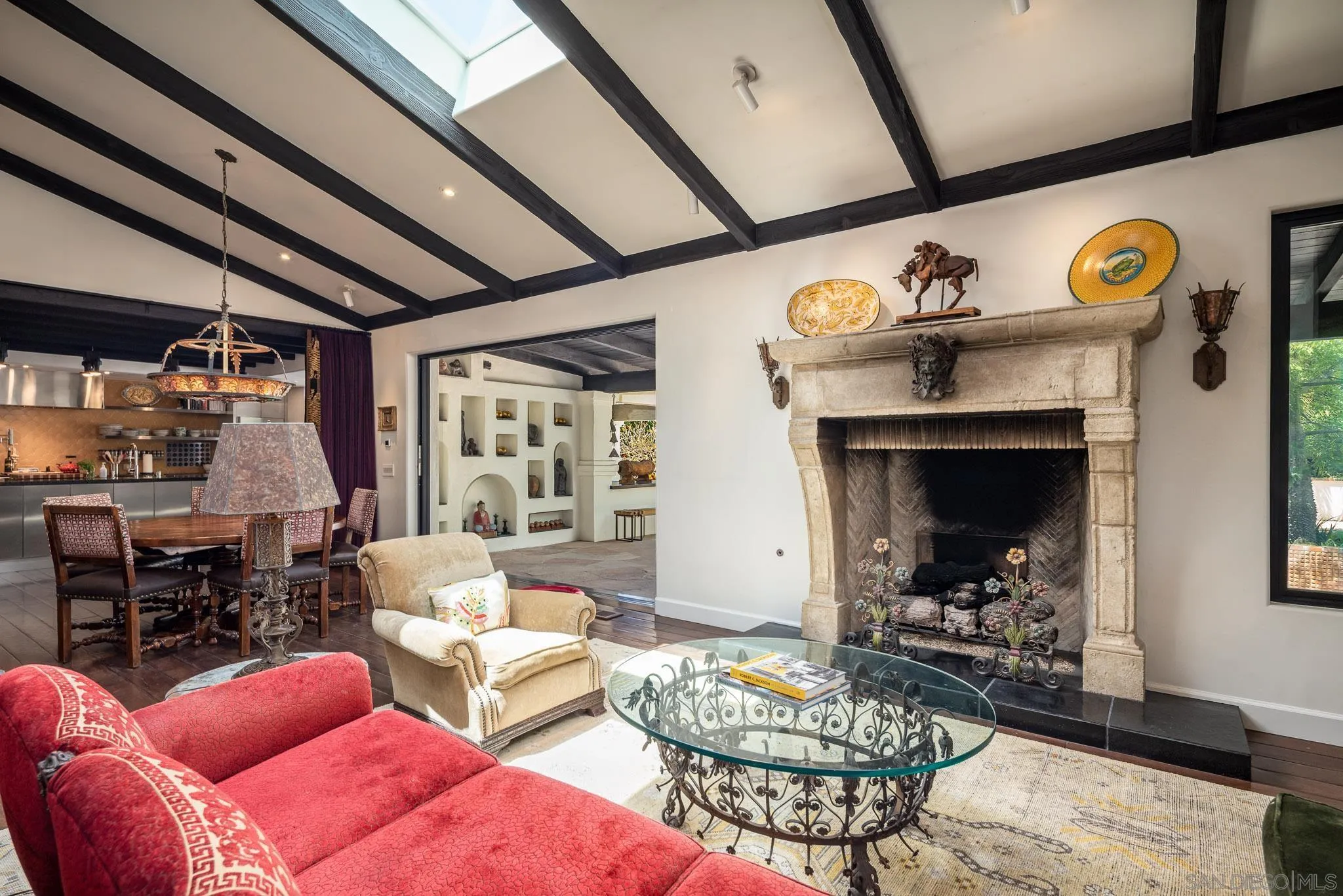 18245 Paseo Victoria Rancho Santa Fe, CA 92067 - Photo 11 of 40 a living room with furniture and a fireplace
