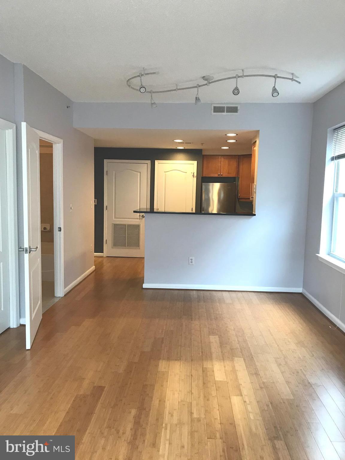 1111 11th Street Northwest, Unit 510 Washington, DC 20001 - Photo 4 of 13 a view of a room with a window
