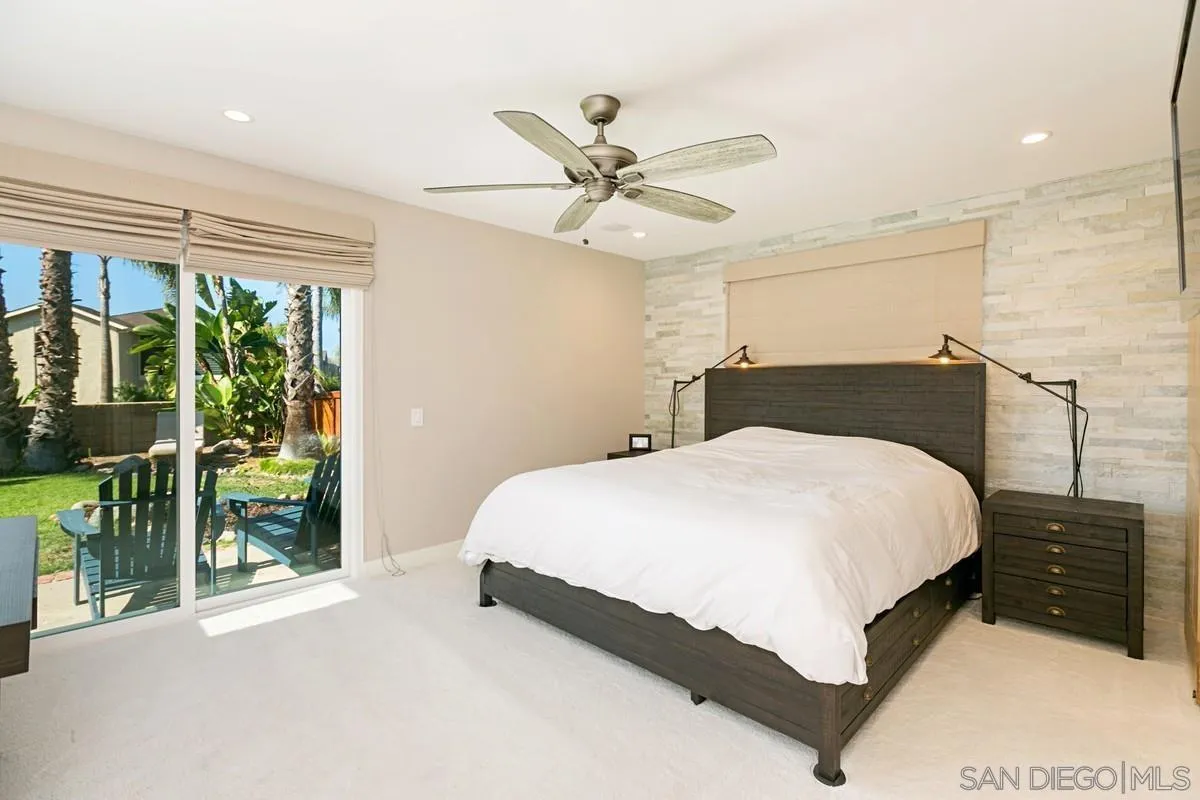 450 Summer View Circle Encinitas, CA 92024 - Photo 15 of 30 a bedroom with a bed and window