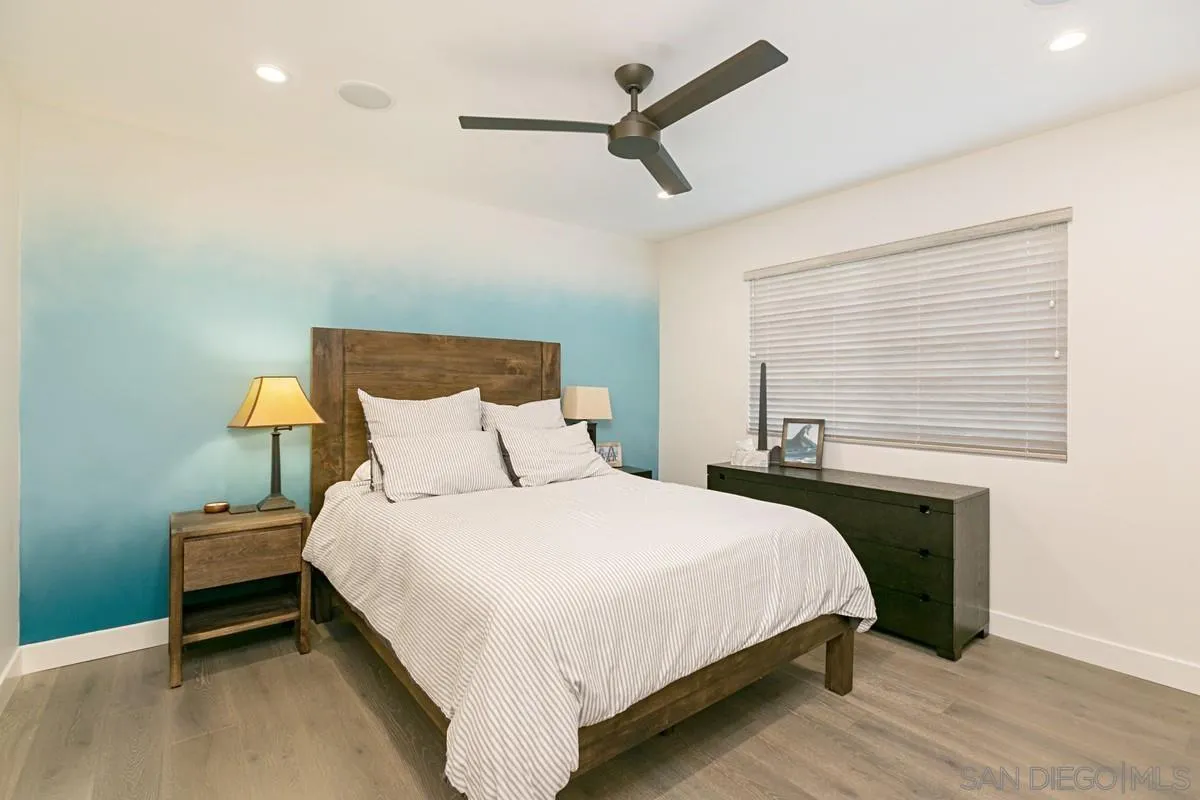 450 Summer View Circle Encinitas, CA 92024 - Photo 20 of 30 a bedroom with a bed and a ceiling fan