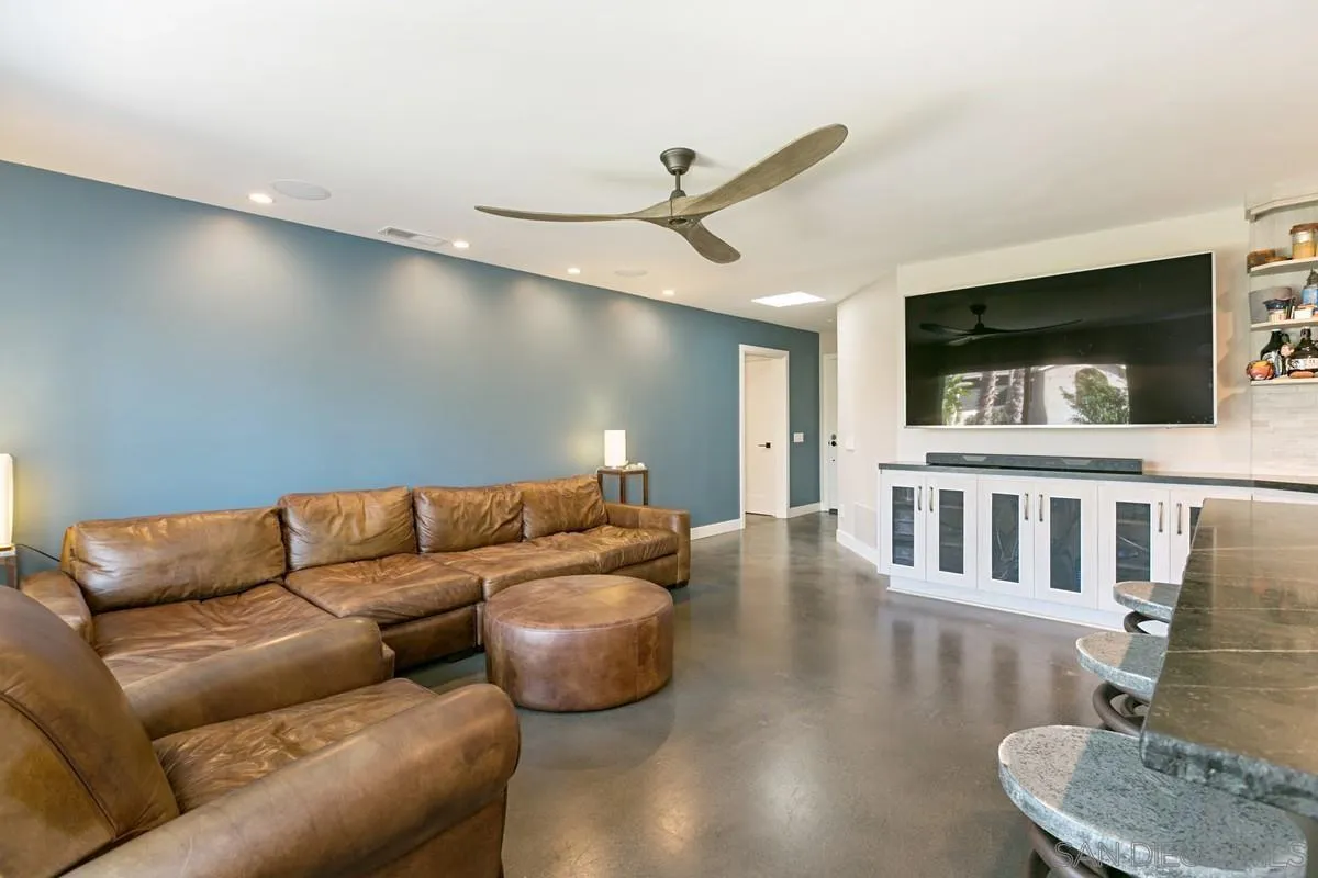 450 Summer View Circle Encinitas, CA 92024 - Photo 7 of 30 a living room with furniture and a flat screen tv