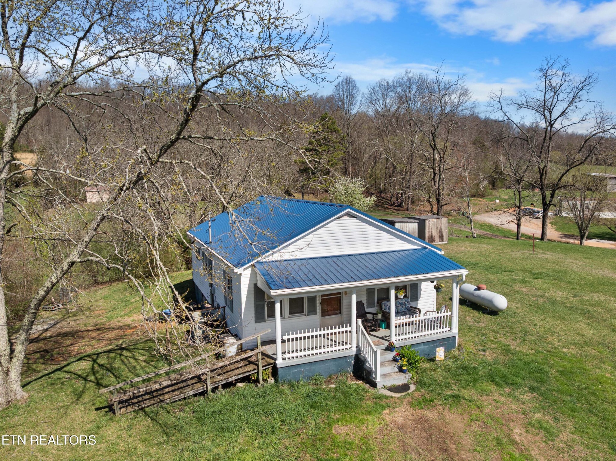 385 Hubbs Grove Road Maynardville, TN 37807 - Photo 22 of 33 a front view of a house with garden