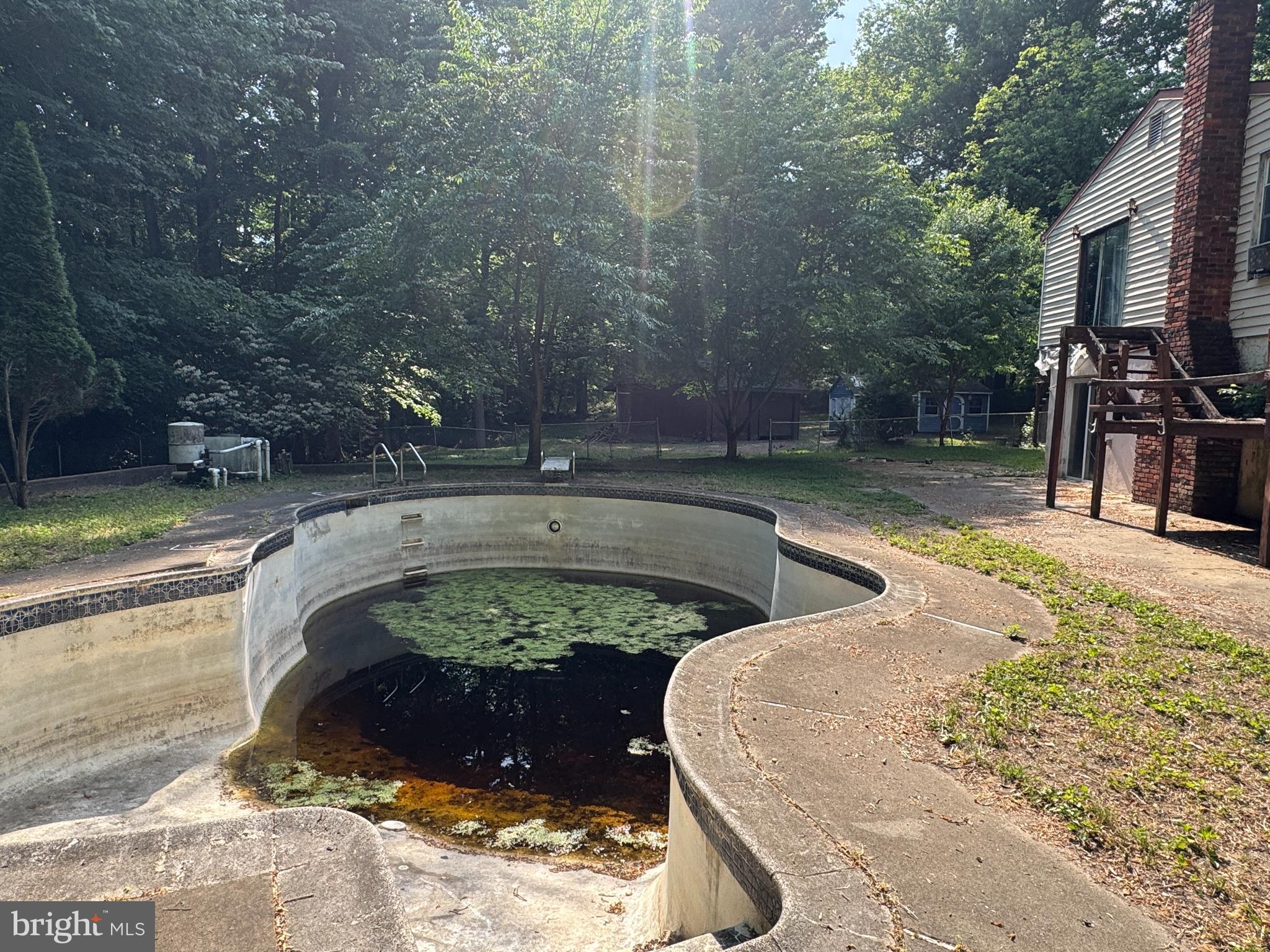 20 Little Mill Road Lindenwold, NJ 08021 - Photo 7 of 9 a view of a swimming pool with a patio