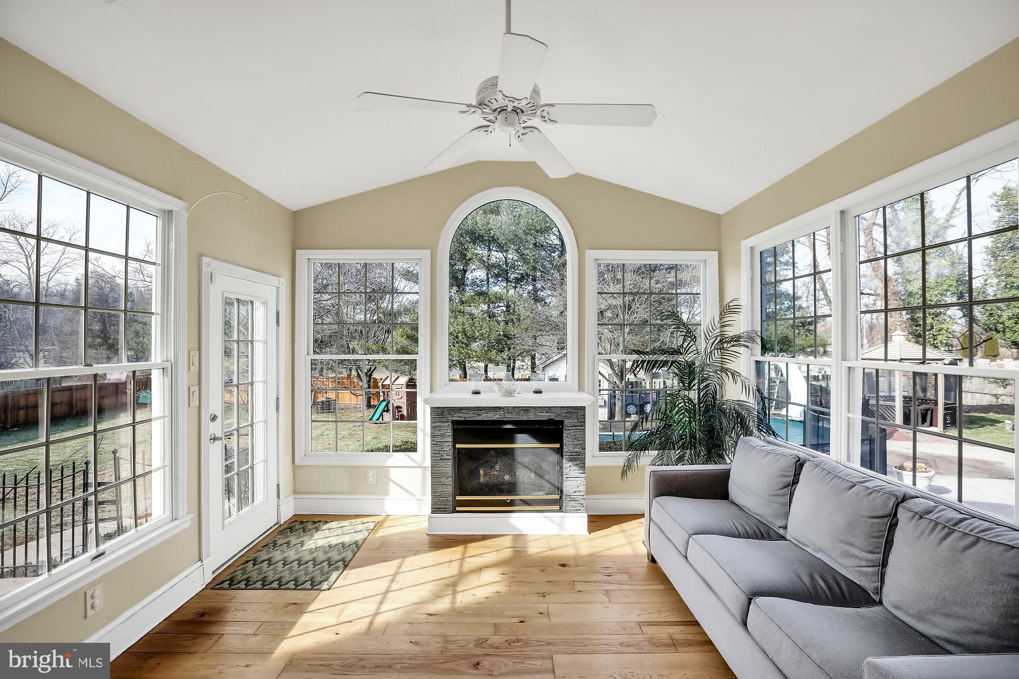 893 Slate Hill Road Yardley, PA 19067 - Photo 11 of 36 4 seasons sun room with gas fireplace