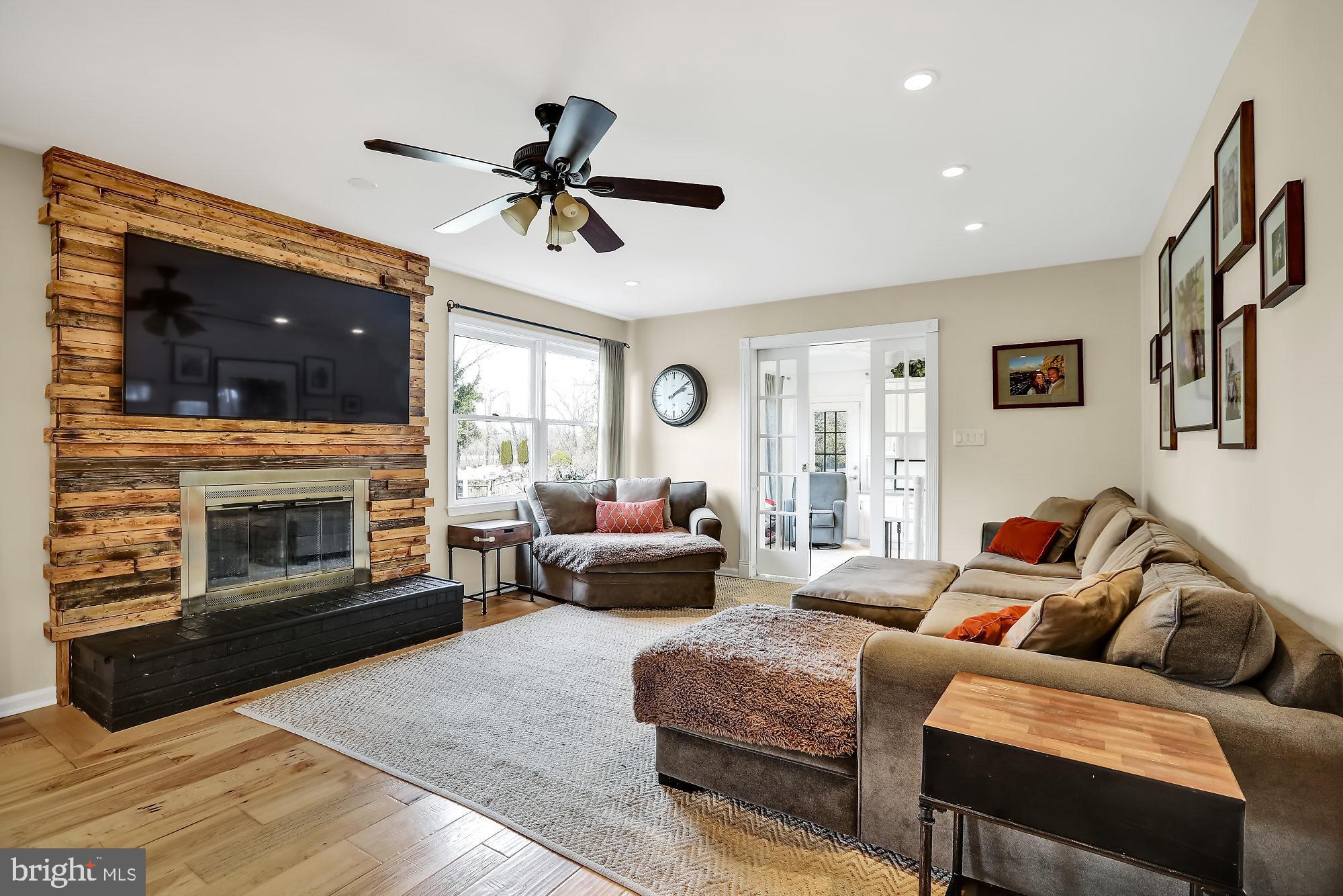 893 Slate Hill Road Yardley, PA 19067 - Photo 12 of 36 Family room with wood burning fireplace