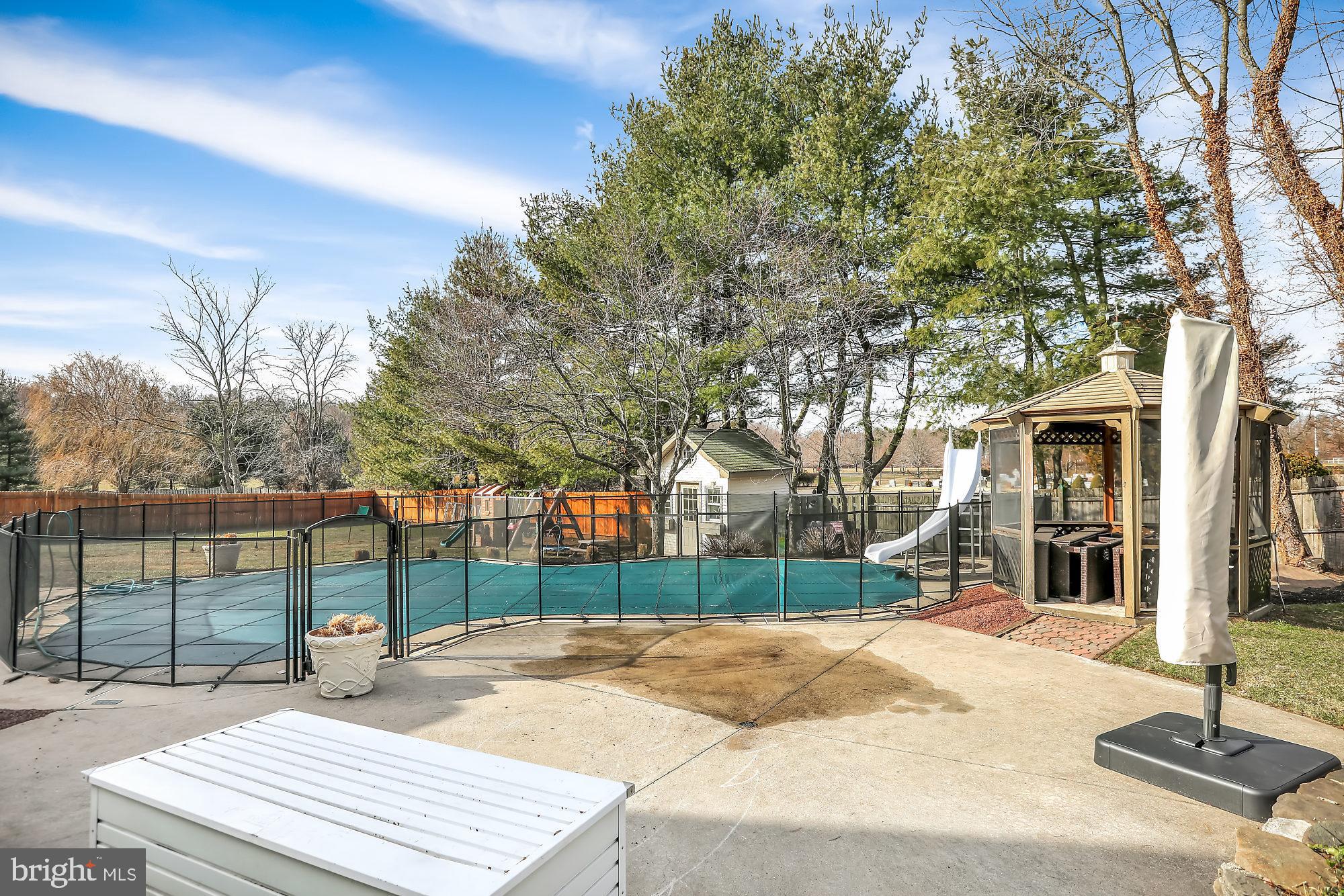 893 Slate Hill Road Yardley, PA 19067 - Photo 30 of 36 Concrete free form pool