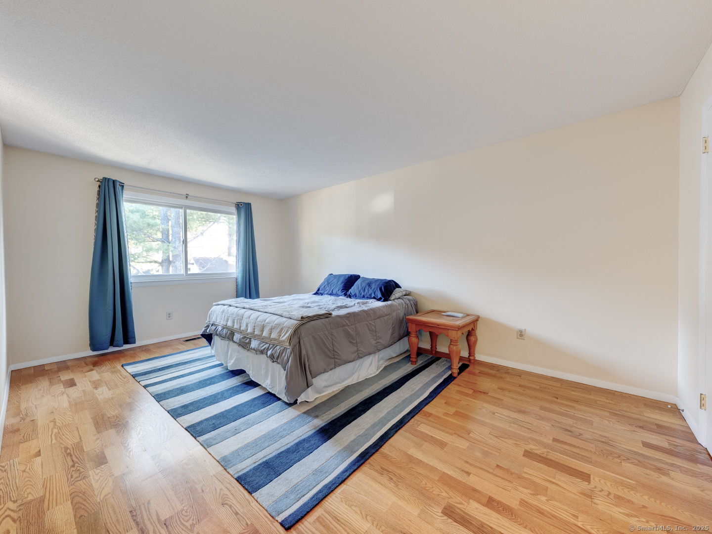 122 Cottonwood Road, Unit 122 Newington, CT 06111 - Photo 20 of 31 a bedroom with a bed and window