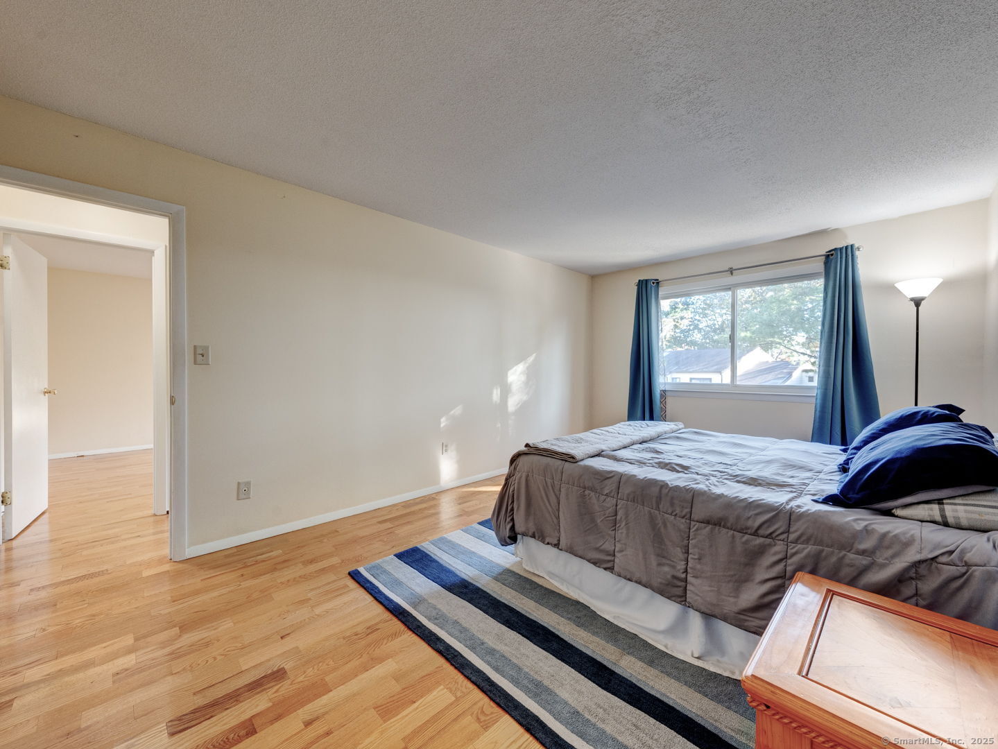 122 Cottonwood Road, Unit 122 Newington, CT 06111 - Photo 21 of 31 a bedroom with a bed and window