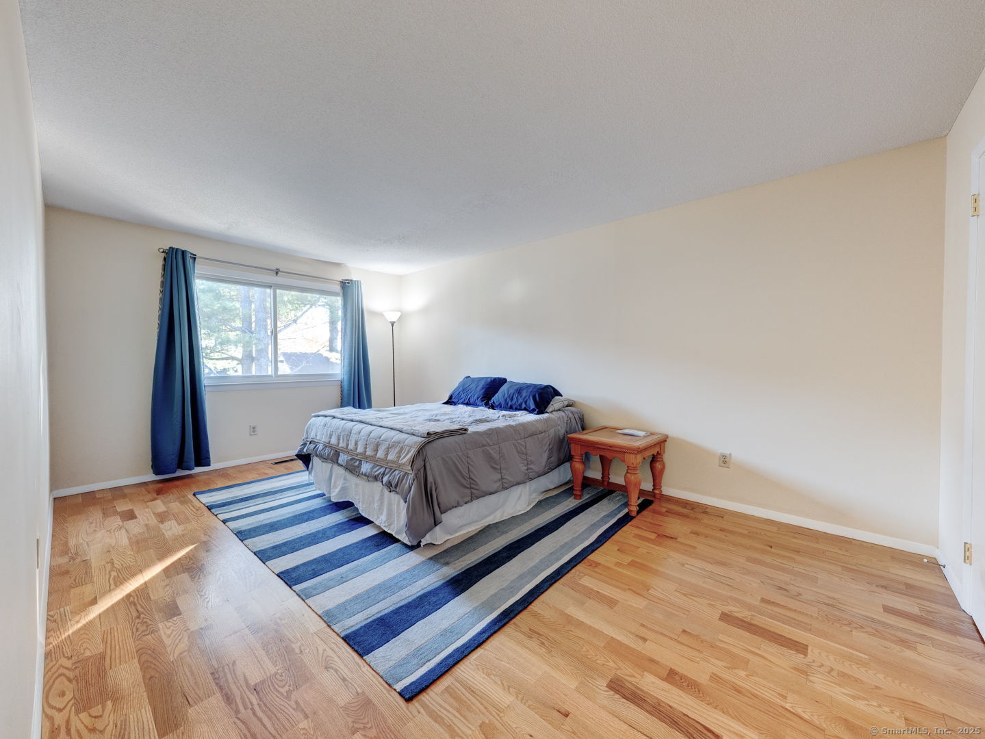 122 Cottonwood Road, Unit 122 Newington, CT 06111 - Photo 22 of 31 a bedroom with a bed and window