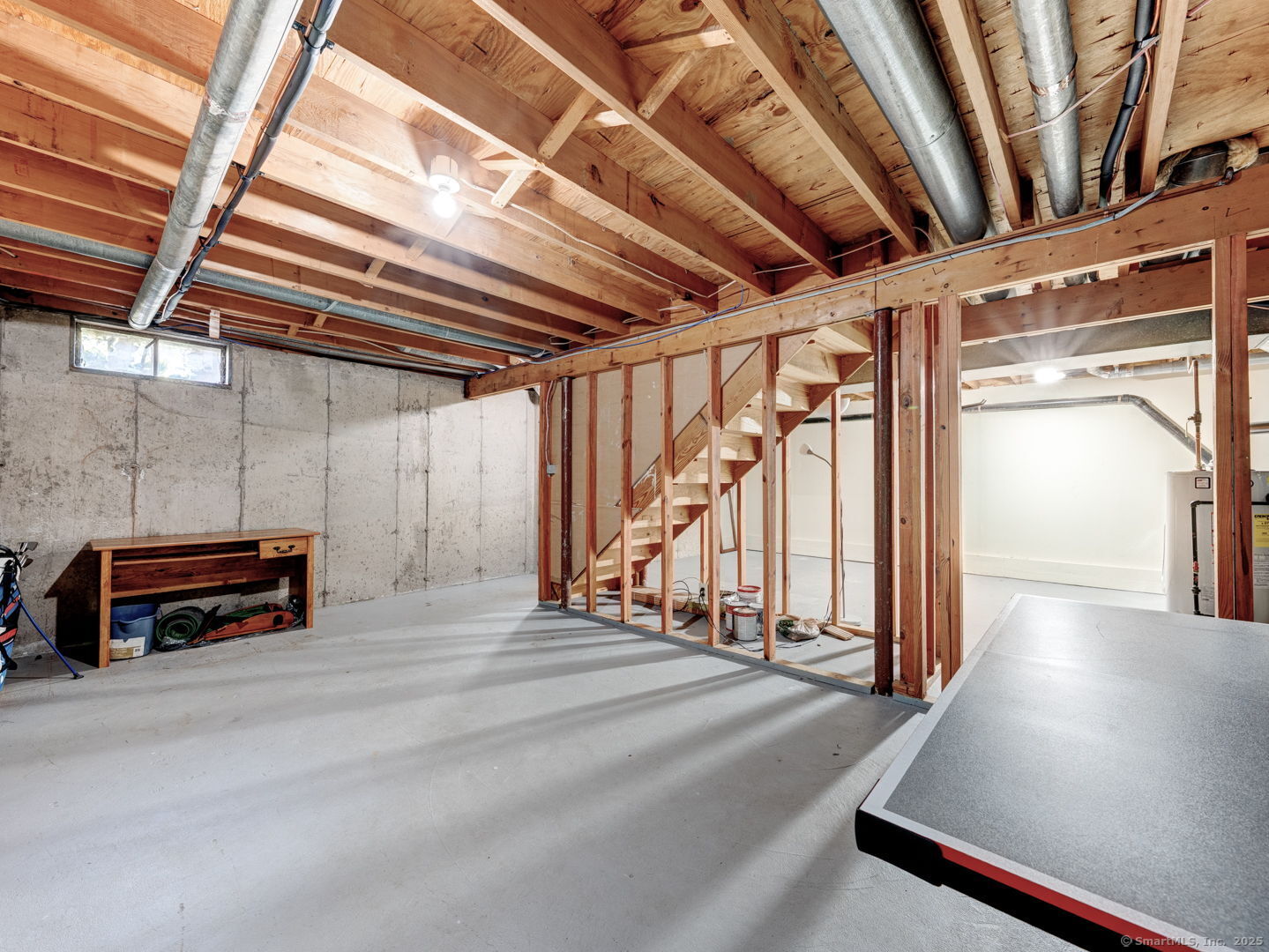 122 Cottonwood Road, Unit 122 Newington, CT 06111 - Photo 30 of 31 a view of an empty room with stairs