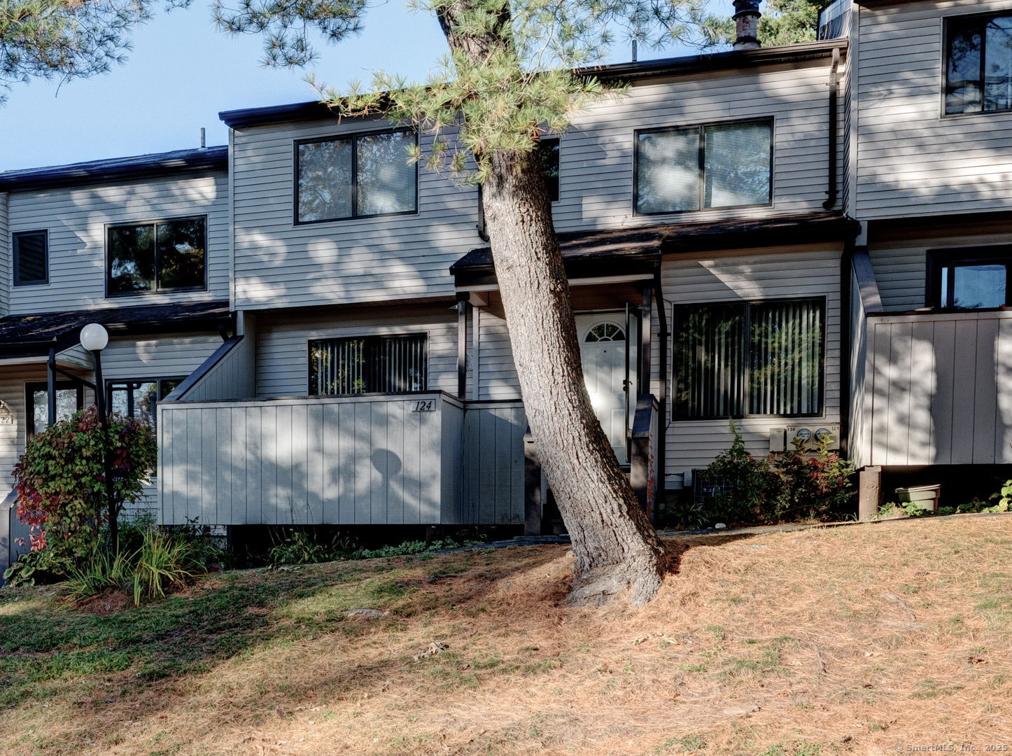 122 Cottonwood Road, Unit 122 Newington, CT 06111 - Photo 31 of 31 a view of a house with a wooden deck
