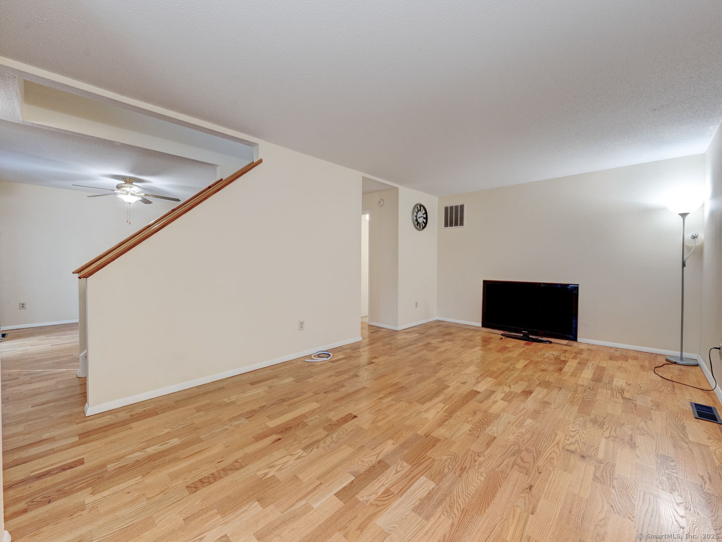 122 Cottonwood Road, Unit 122 Newington, CT 06111 - Photo 9 of 31 a view of empty room with wooden floor