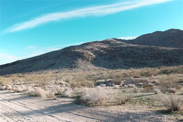 a view of ocean and mountain