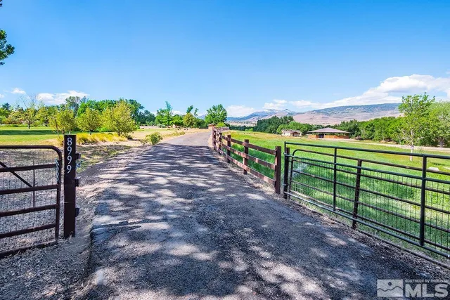 a view of a backyard of a house