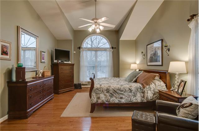 2988 Polo Club Road Nashville, TN 37221 - Photo 11 of 20 Gorgeous master bedroom with vaulted ceiling and huge palladium window. There are two walk-in closets and a linen closet.