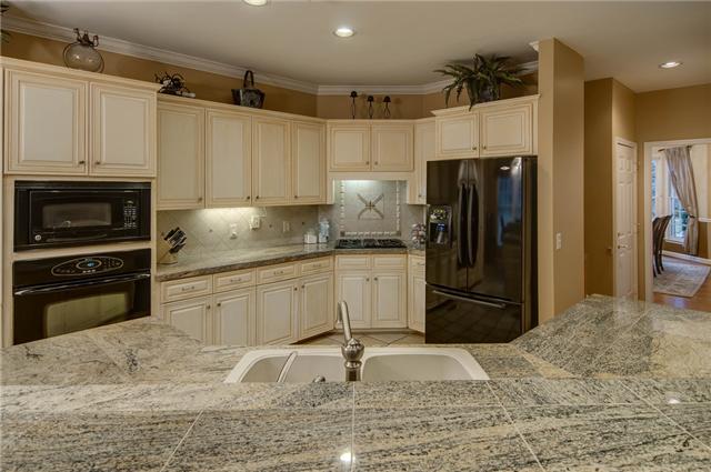 2988 Polo Club Road Nashville, TN 37221 - Photo 5 of 20 Beautiful renovated kitchen with huge granite island and new cabinets. Appliances are new in the last 2 years.