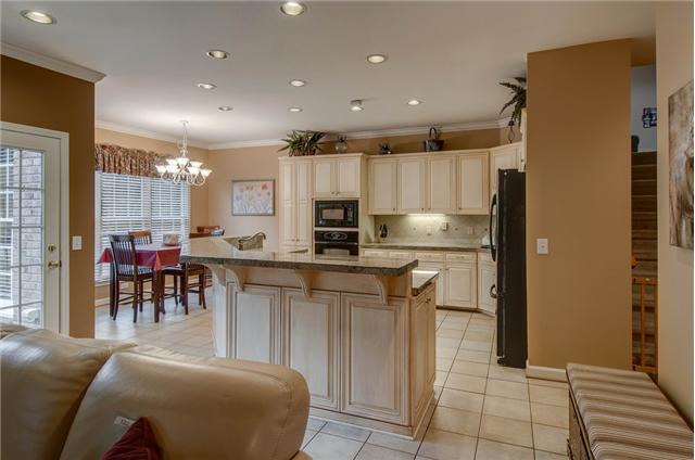 2988 Polo Club Road Nashville, TN 37221 - Photo 7 of 20 Kitchen opens to a sunny breakfast and large family room