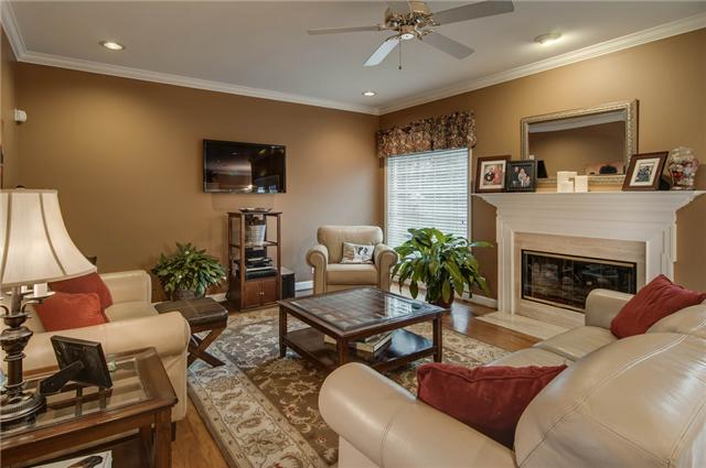 2988 Polo Club Road Nashville, TN 37221 - Photo 8 of 20 Great open family room with cozy fireplace, and glass doors to the deck