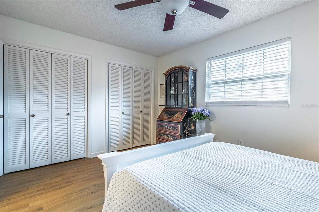 2500 Lee Road, Unit 243 Winter Park, FL 32789 - Photo 16 of 28 a bedroom with a bed dresser and a window