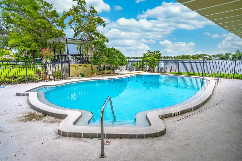 2500 Lee Road, Unit 243 Winter Park, FL 32789 - Photo 20 of 28 a view of a swimming pool with a patio