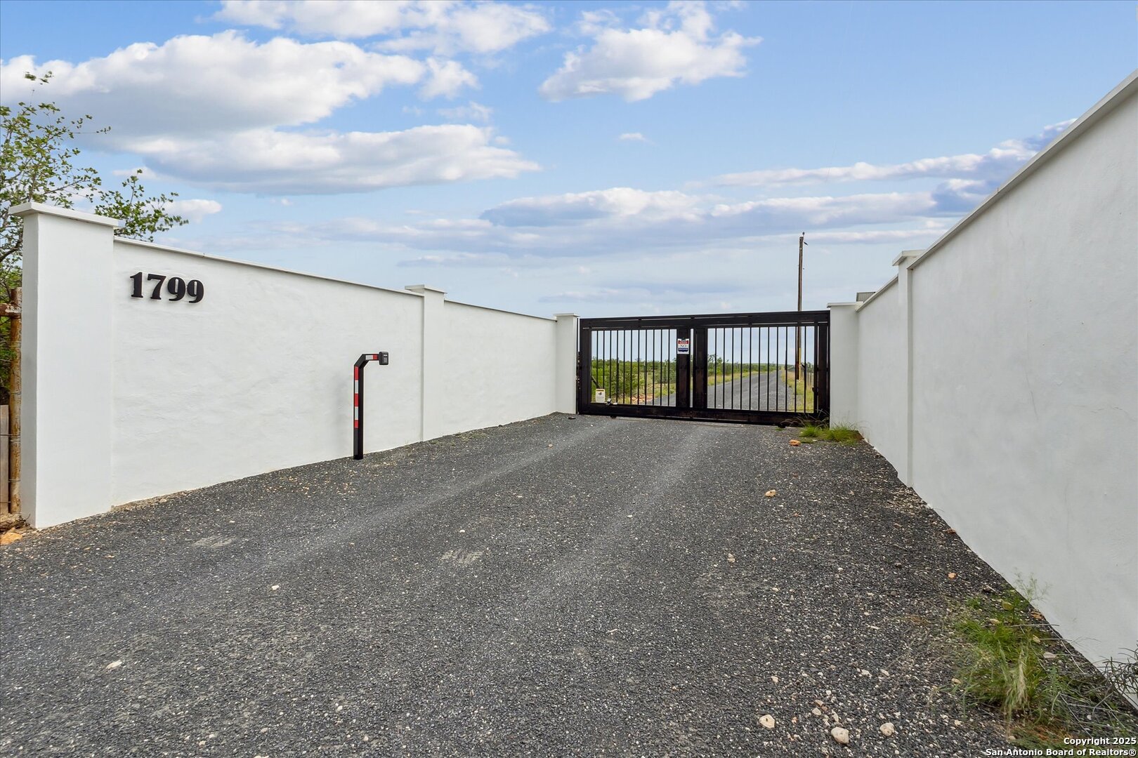 1799 County Road 651 Devine, TX 78016 - Photo 2 of 72 a view of outdoor space and barbecue grill